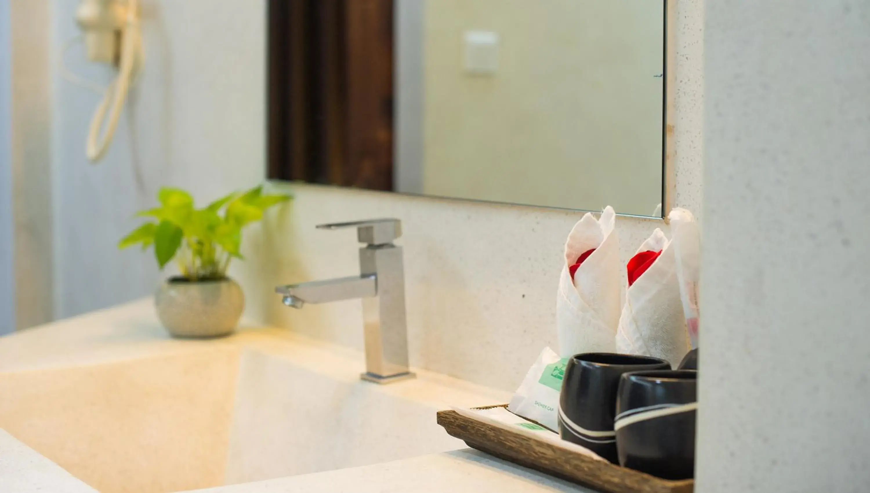 Bathroom in Almond Hotel Bassac River Bathroom in Almond Hotel Bassac River