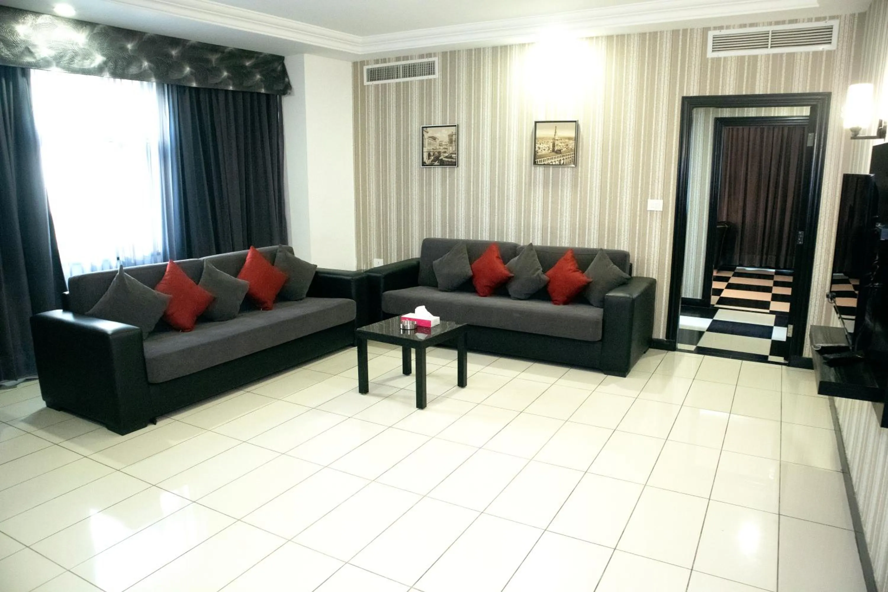 Living room in Easy Inn Hotel Suites