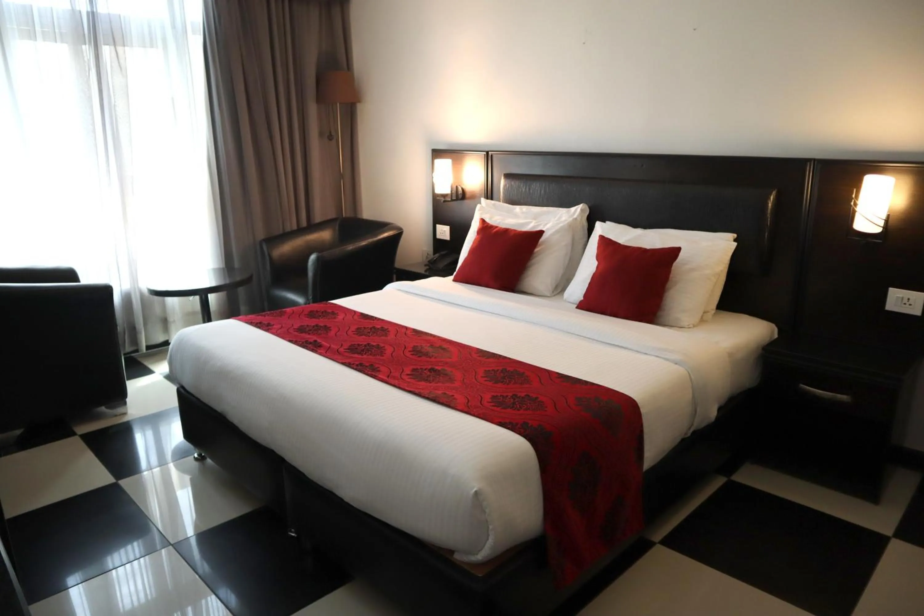 Bedroom, Bed in Easy Inn Hotel Suites