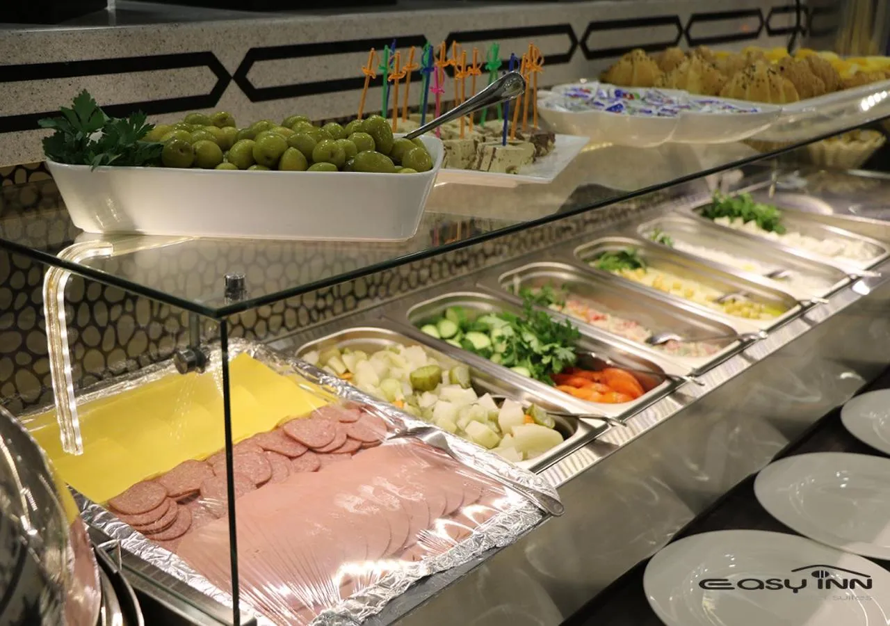 Buffet breakfast in Easy Inn Hotel Suites