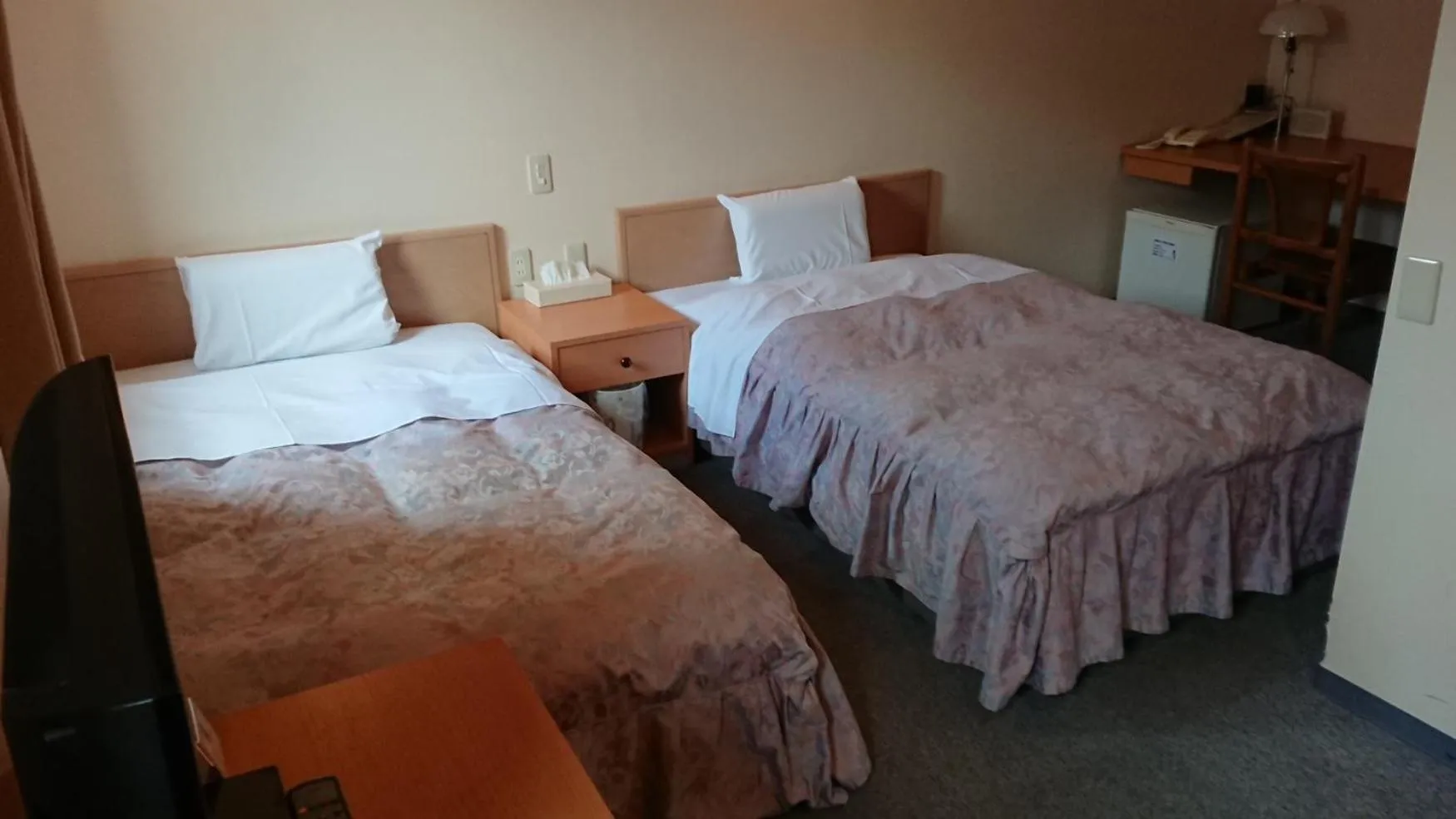 Photo of the whole room, Bed in Hotel Muroran Hills