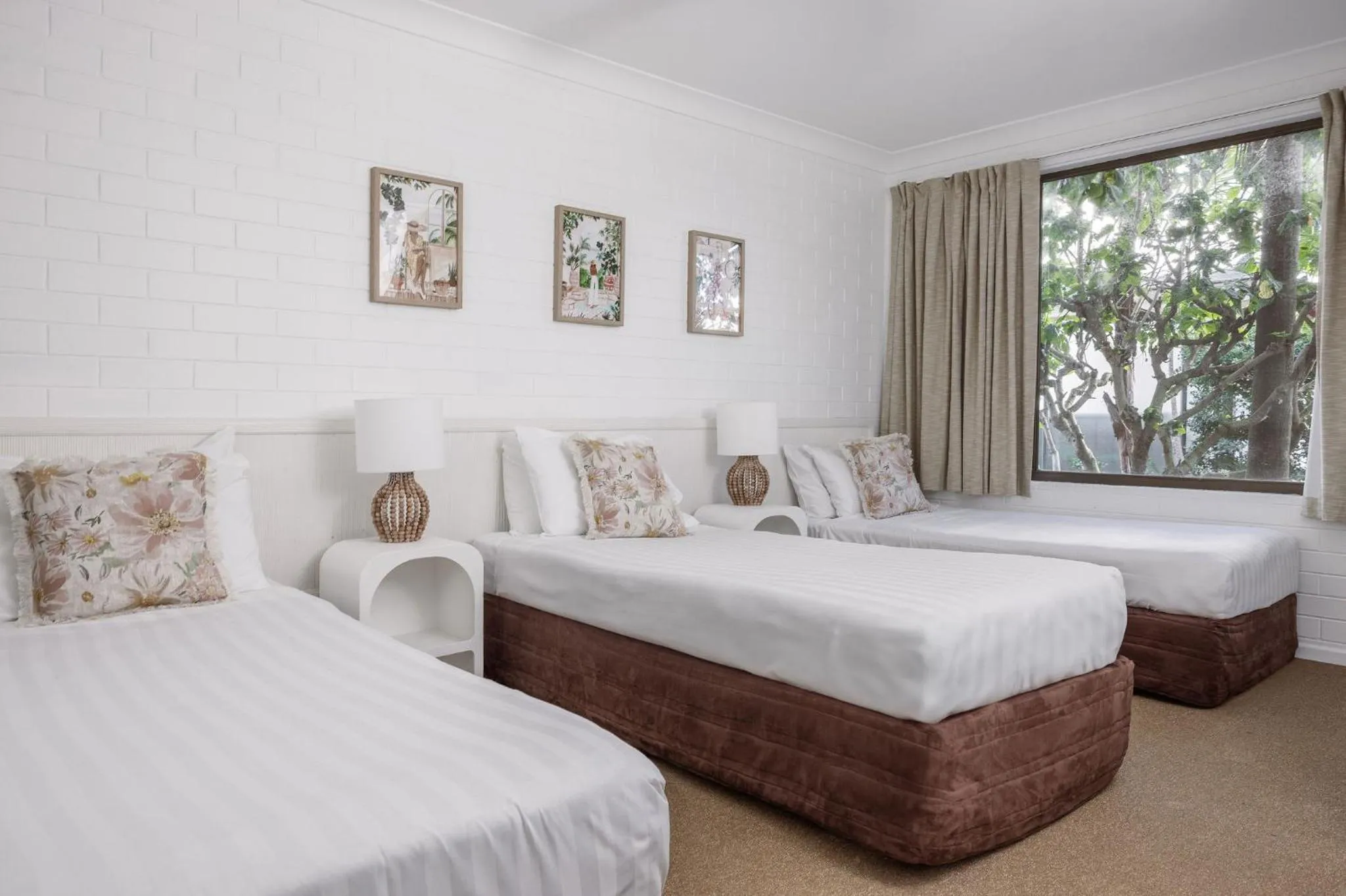 Bed in Main Beach Apartments