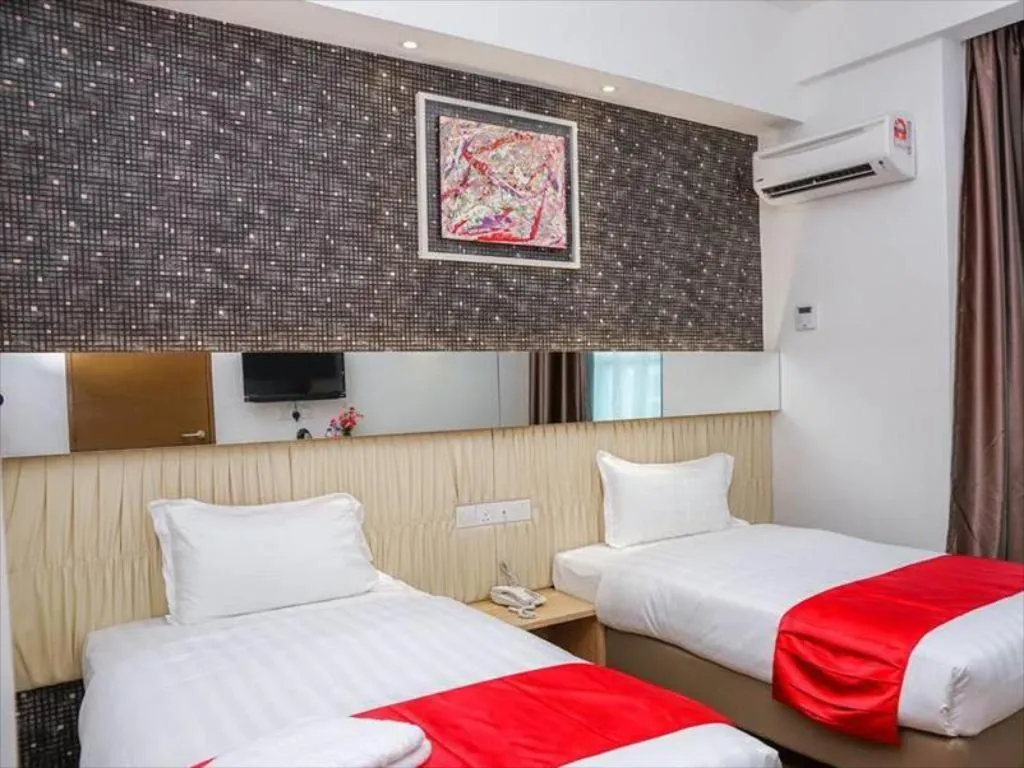 Bed in 906 Premier Hotel