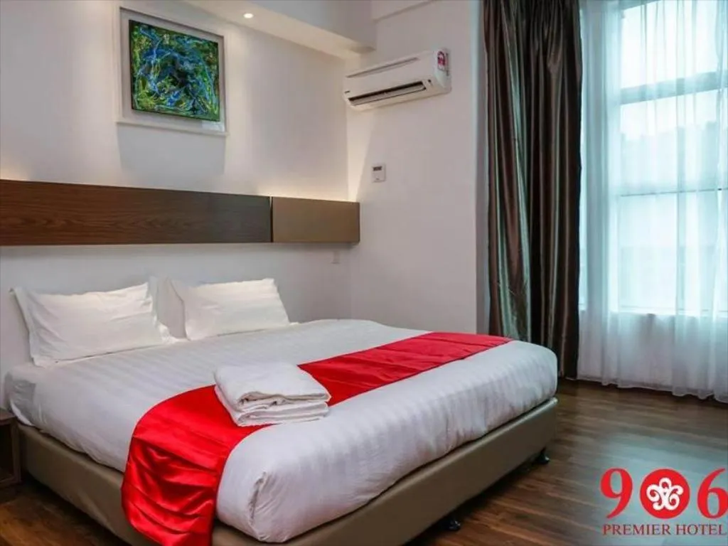 Bed in 906 Premier Hotel