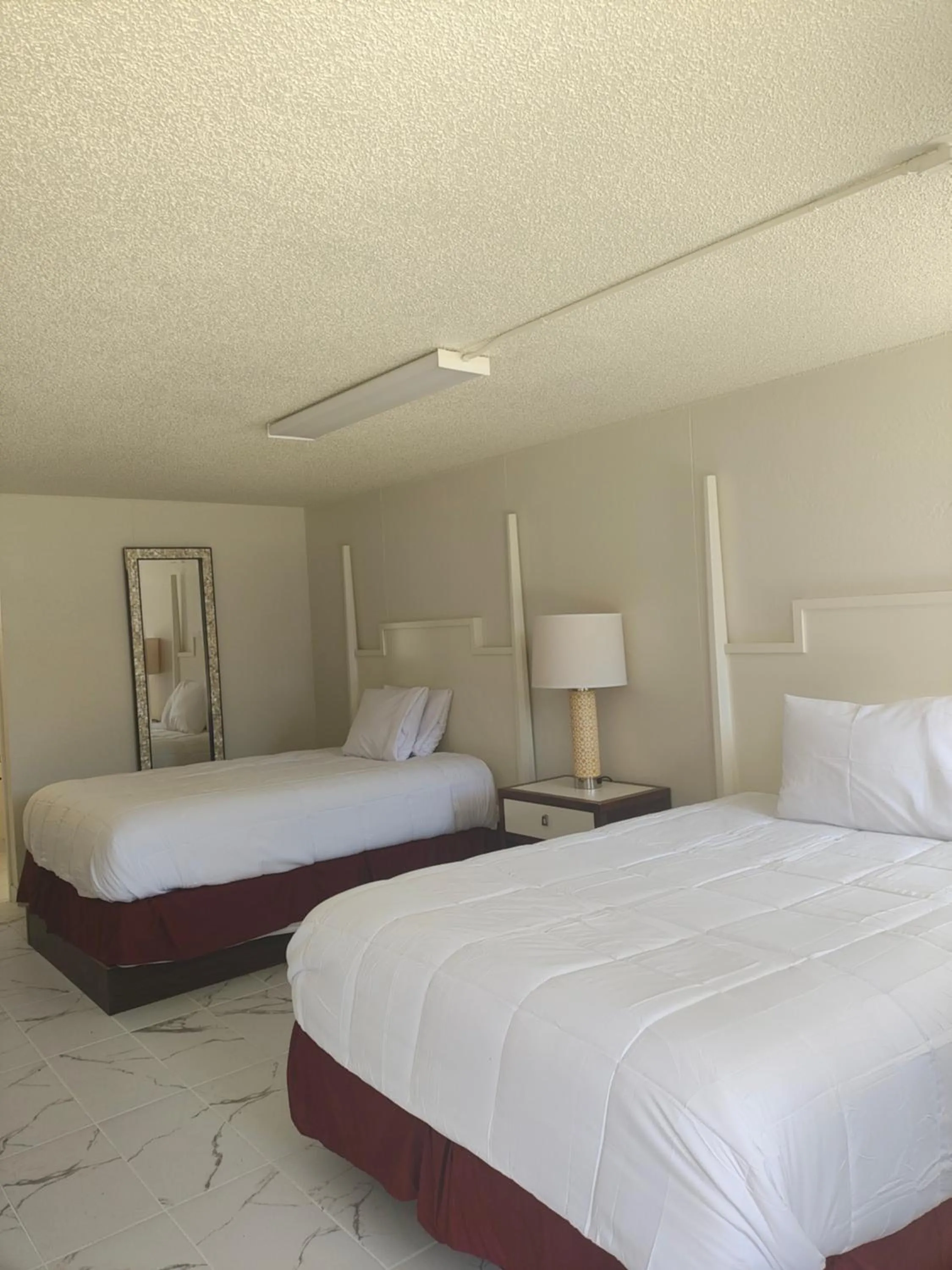 Bed in Super Inn Motel