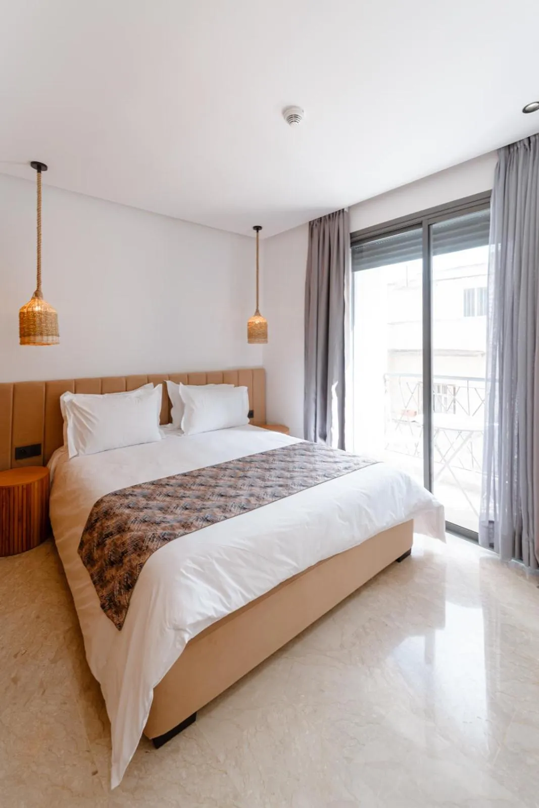 Bed in Spinoza House Appart Hôtel