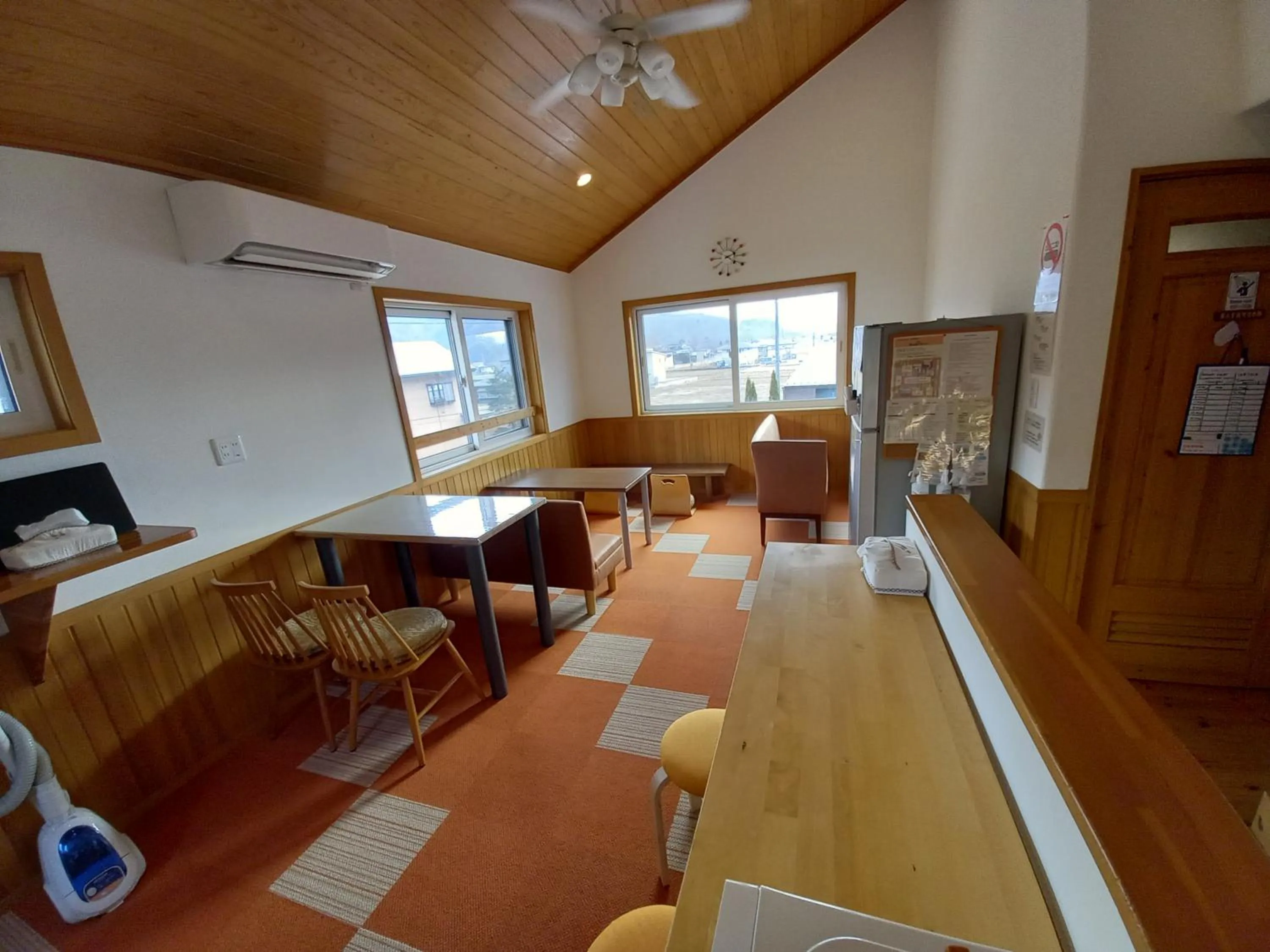 Living room in Orange Cabin Inn far from station