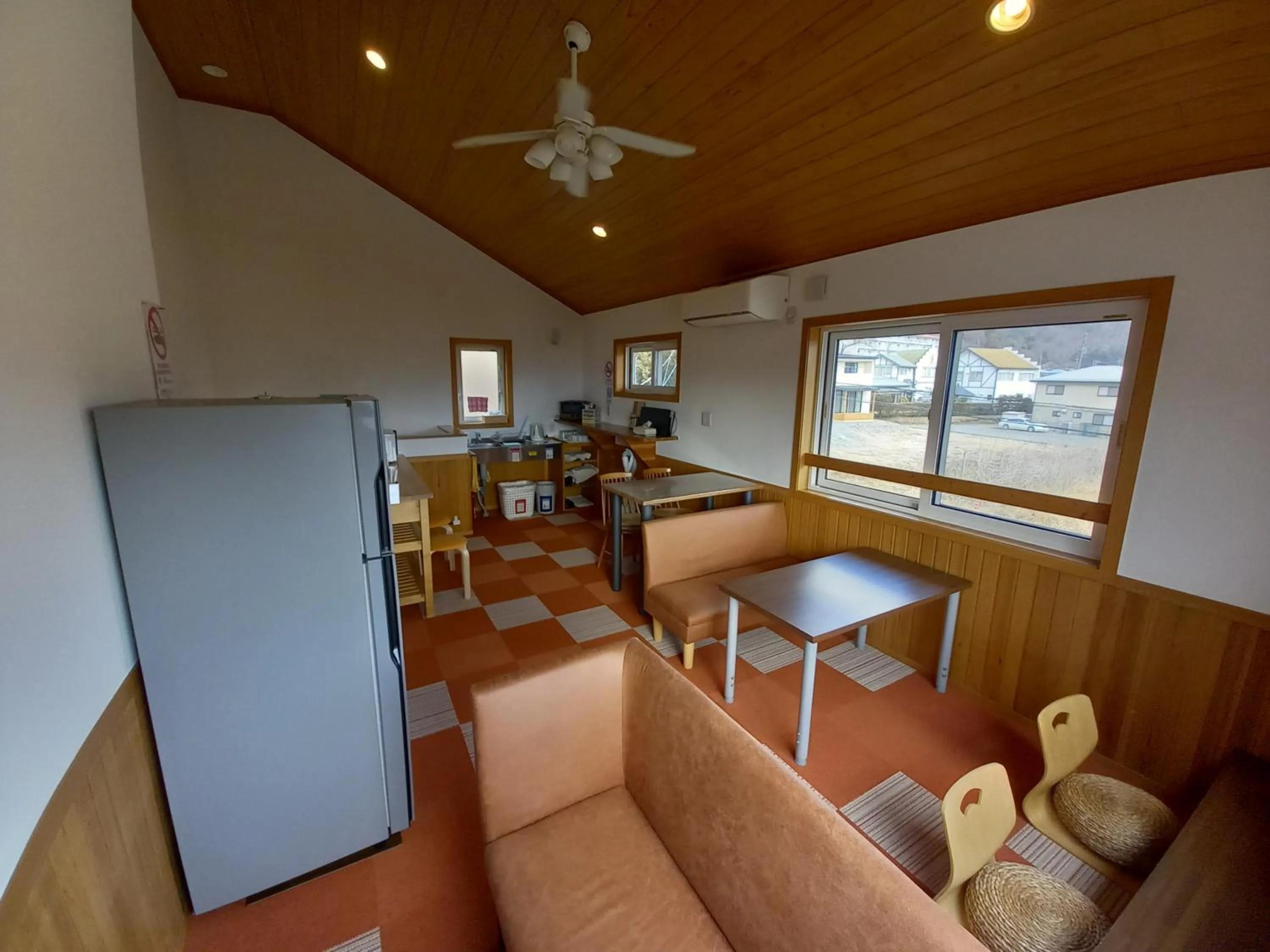 Living room in Orange Cabin Inn far from station