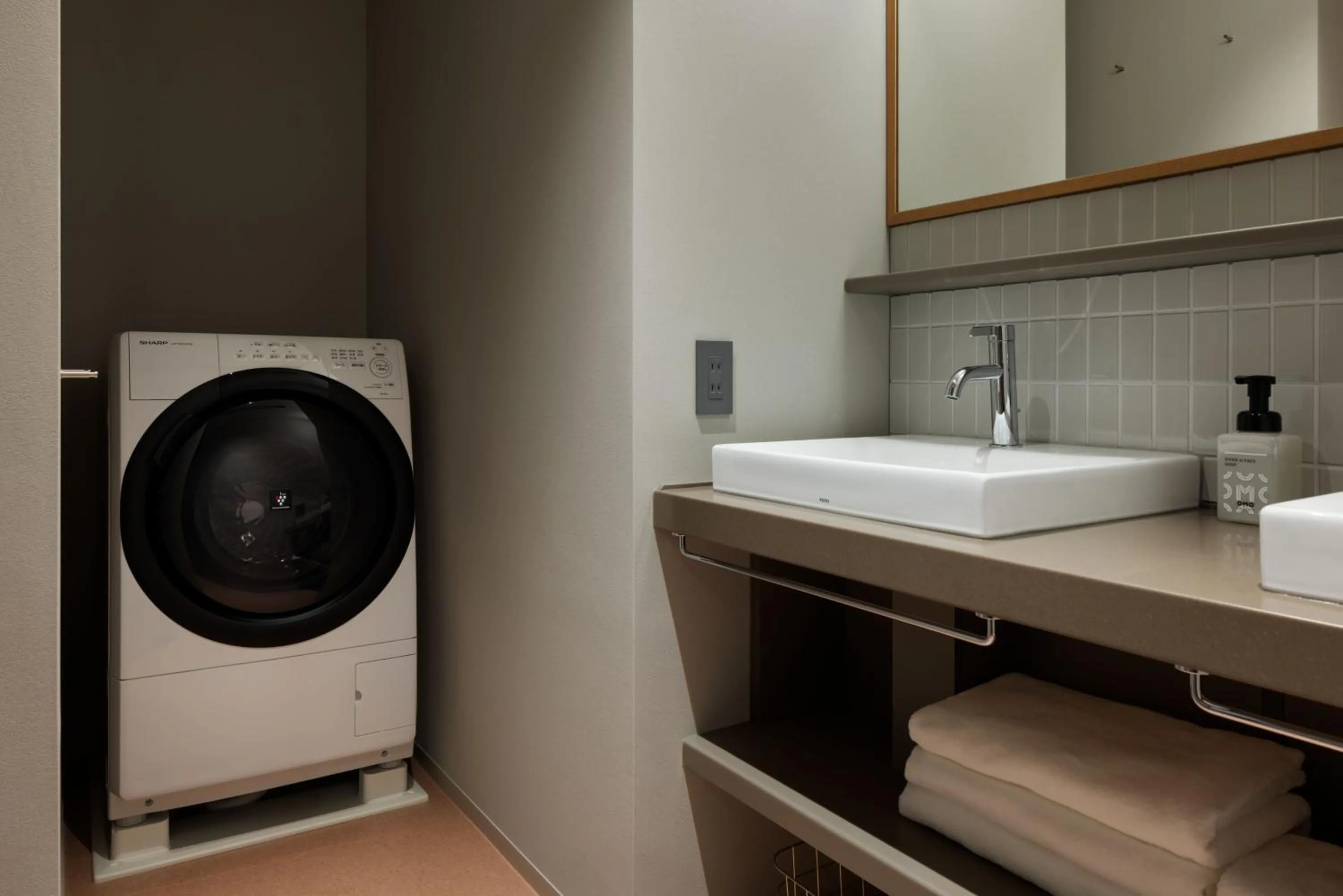 washing machine in OMO7 Yokohama by Hoshino Resorts
