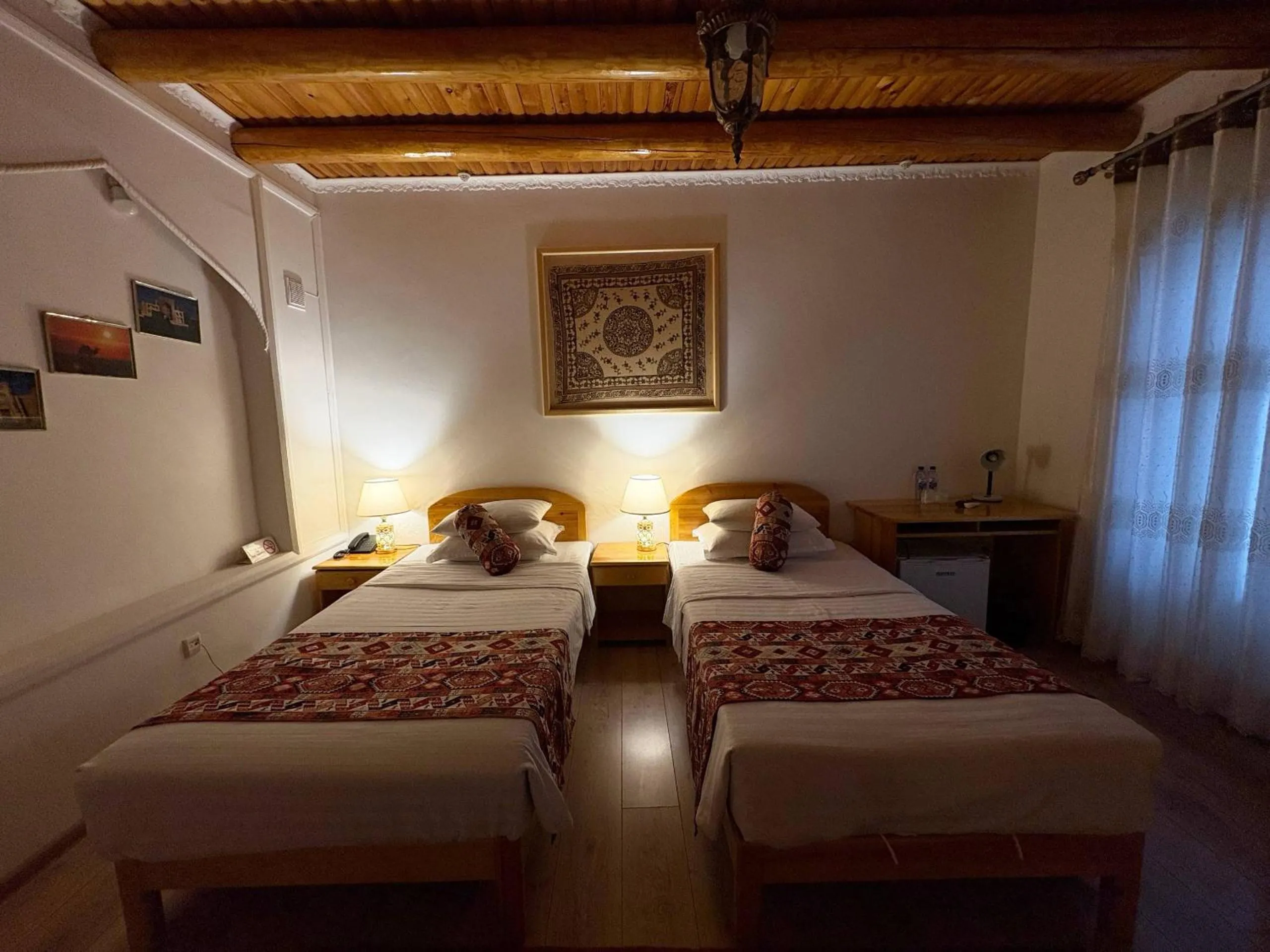 Bed in Porso Boutique Hotel