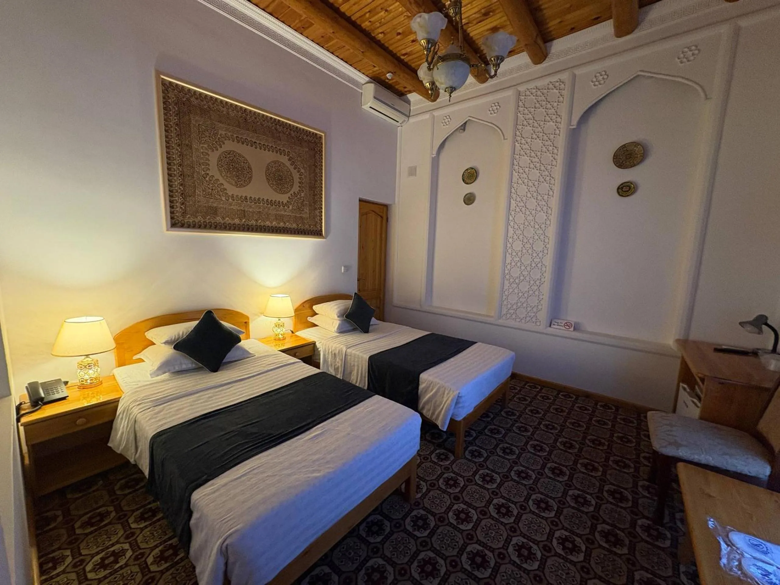 Bed in Porso Boutique Hotel