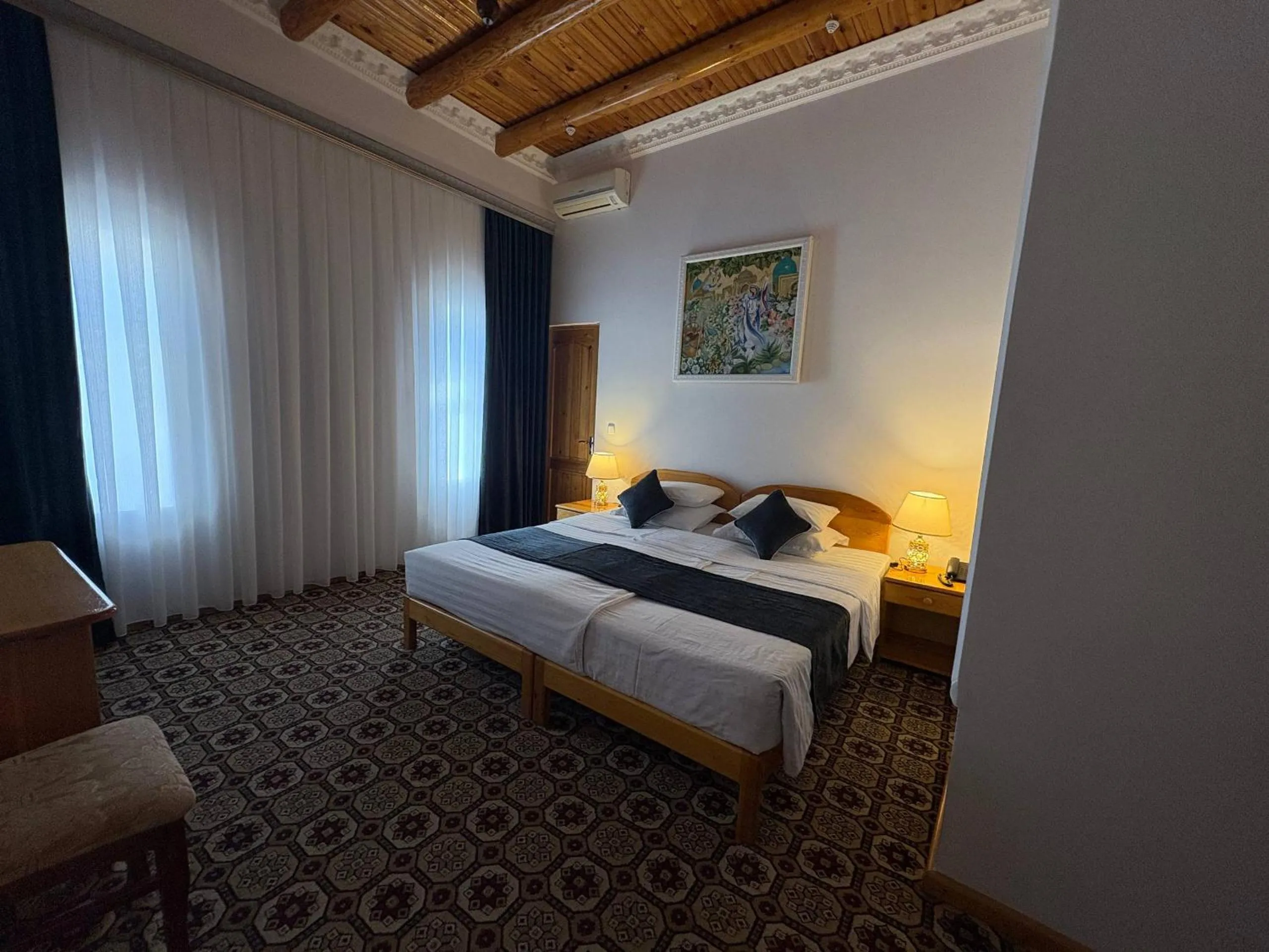 Bed in Porso Boutique Hotel