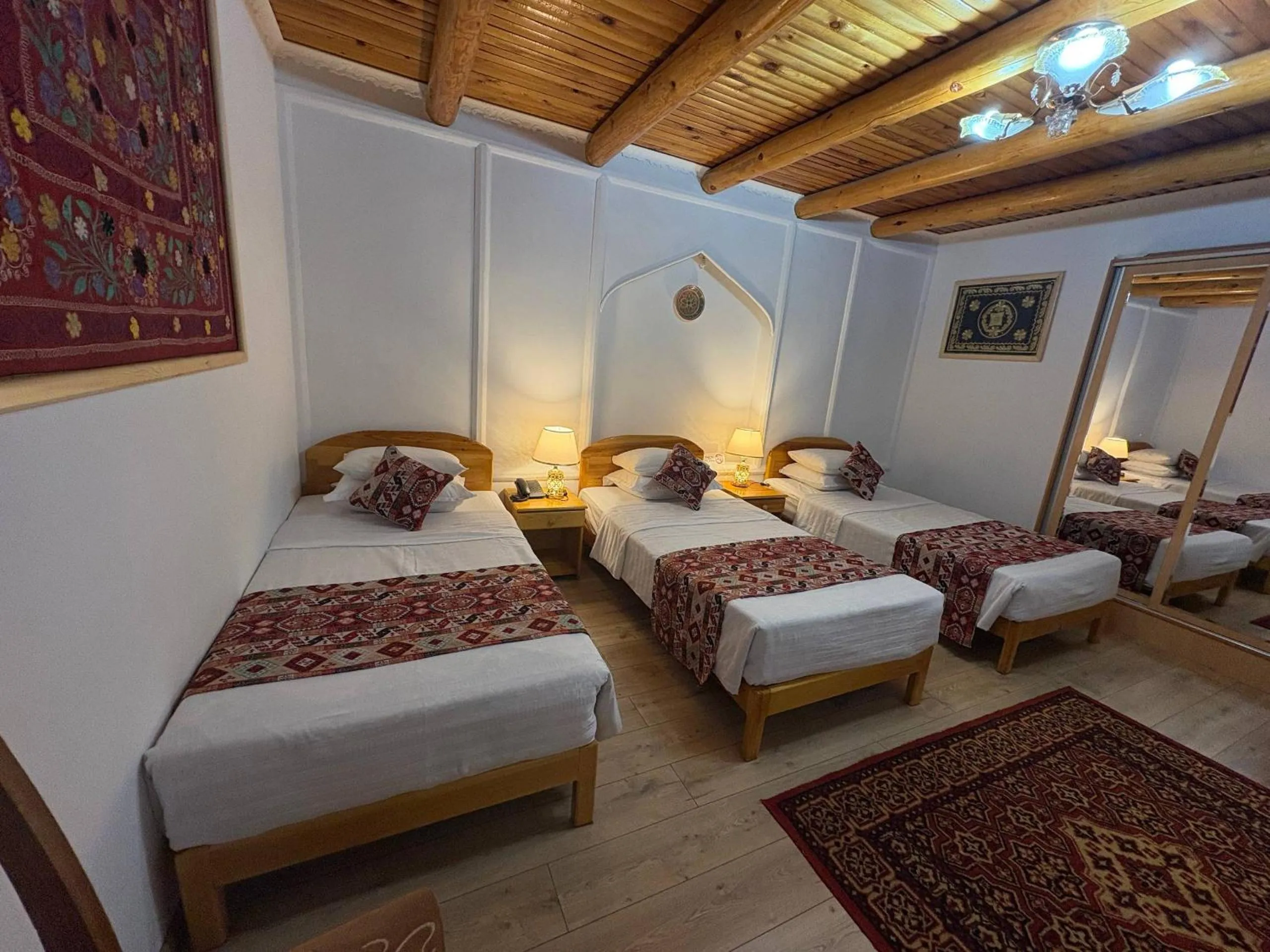 Bed in Porso Boutique Hotel