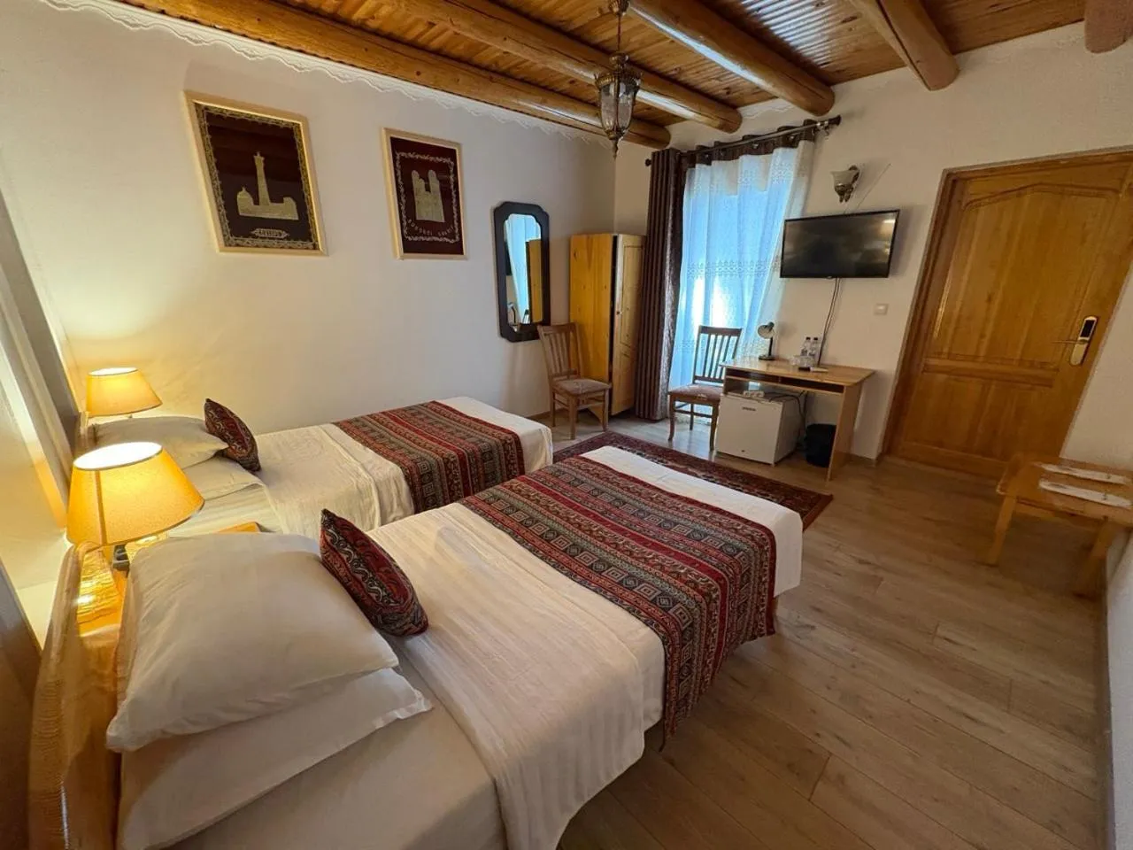 Bed in Porso Boutique Hotel