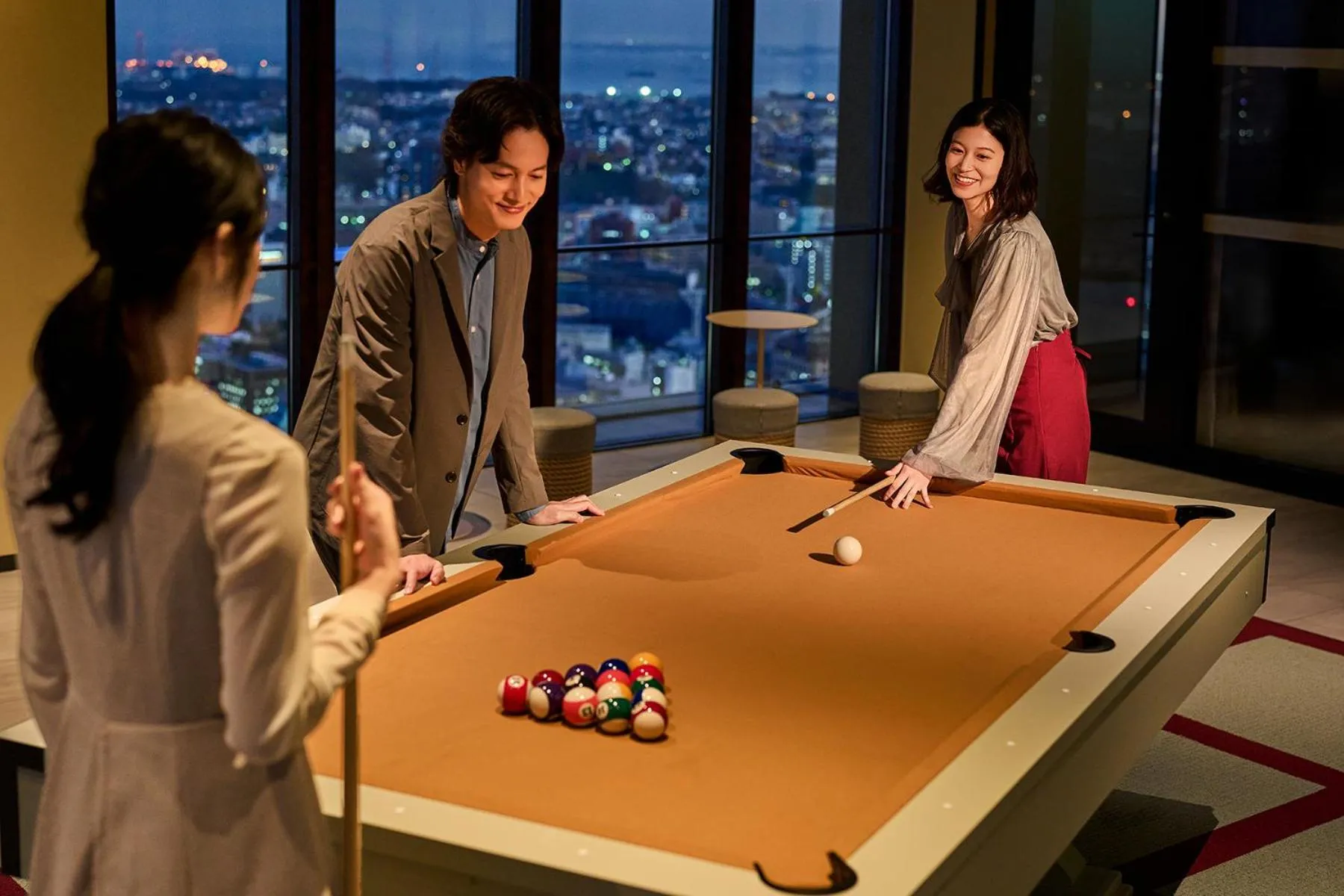 Communal lounge/ TV room in OMO5 Yokohama Bashamichi by Hoshino Resorts