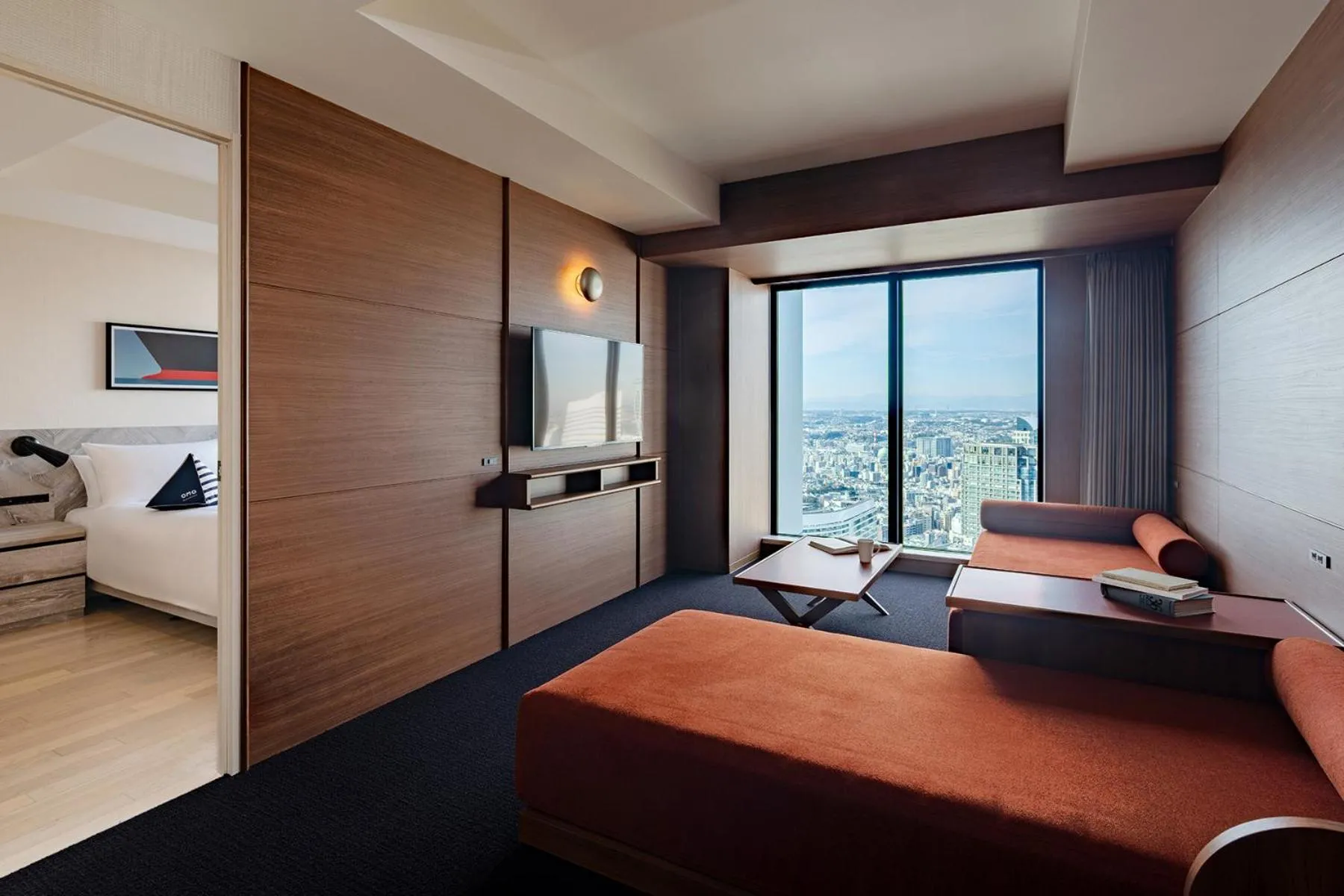 Living room, Bed in OMO5 Yokohama Bashamichi by Hoshino Resorts