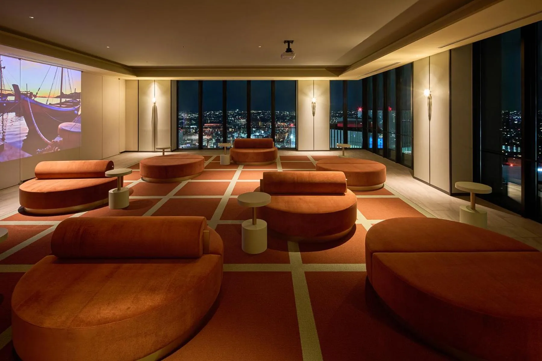 Communal lounge/ TV room in OMO5 Yokohama Bashamichi by Hoshino Resorts