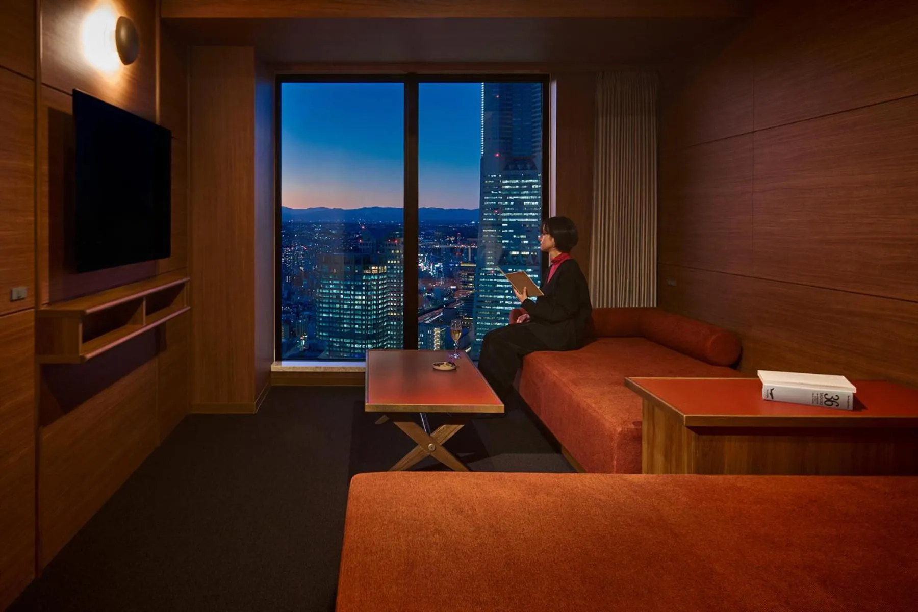 Living room in OMO5 Yokohama Bashamichi by Hoshino Resorts