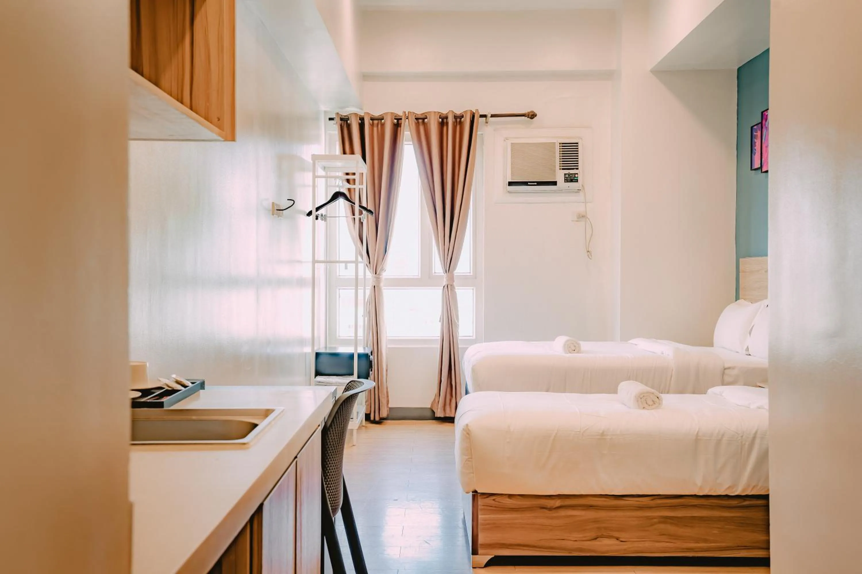 Photo of the whole room, Bed in I Suites Hotel Malate