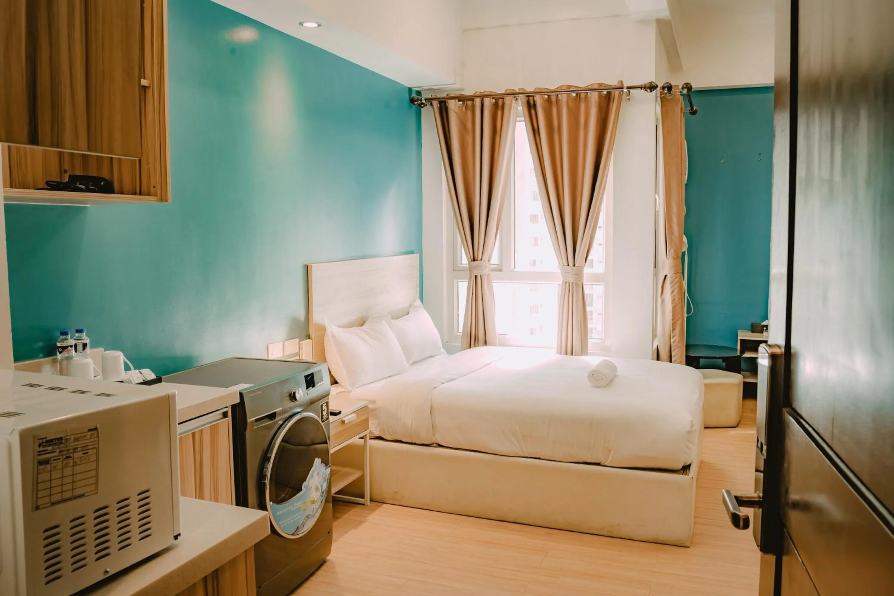 Photo of the whole room, Bed in I Suites Hotel Malate