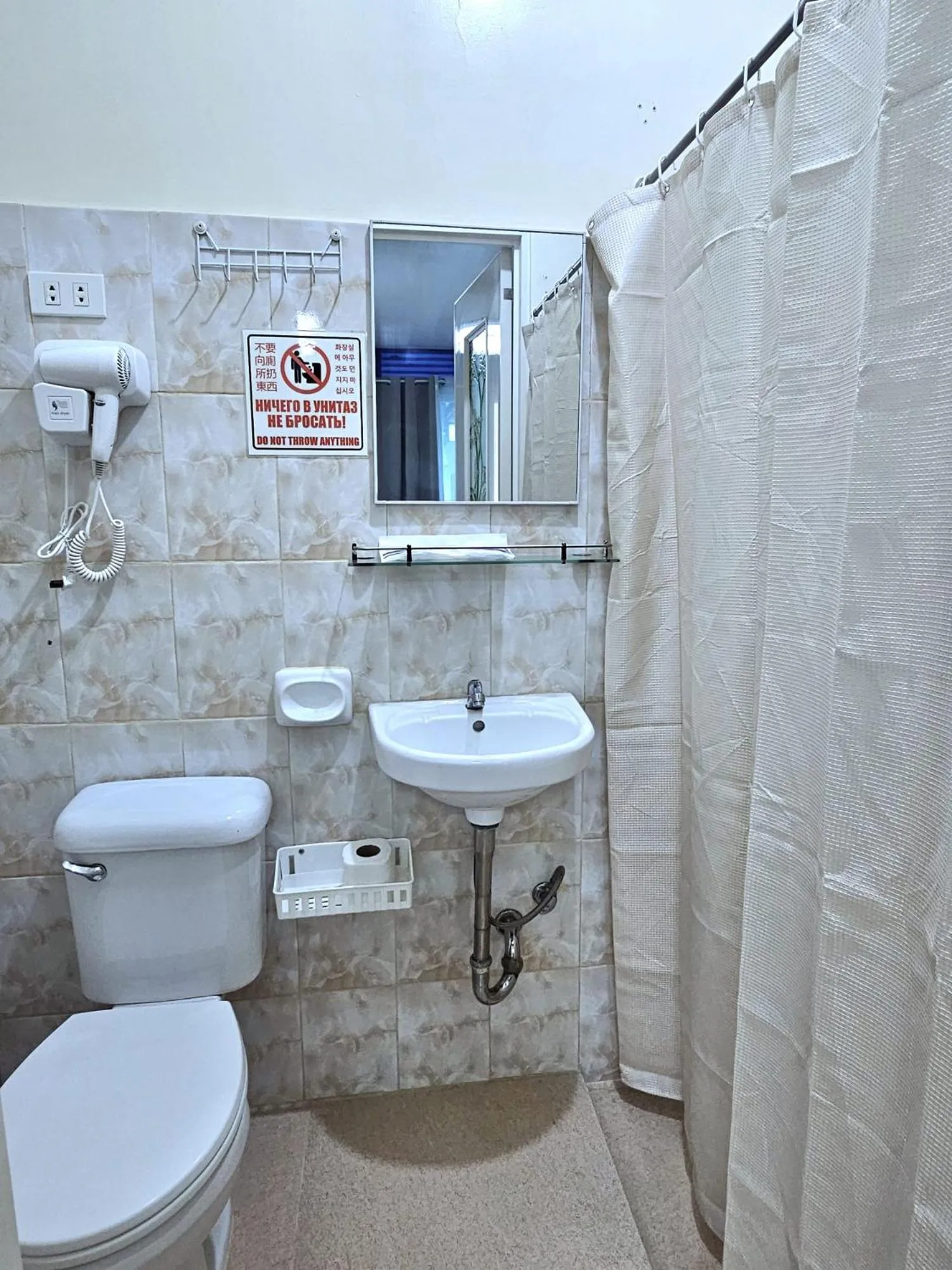 Shower in Mangotree Apartel & Resort