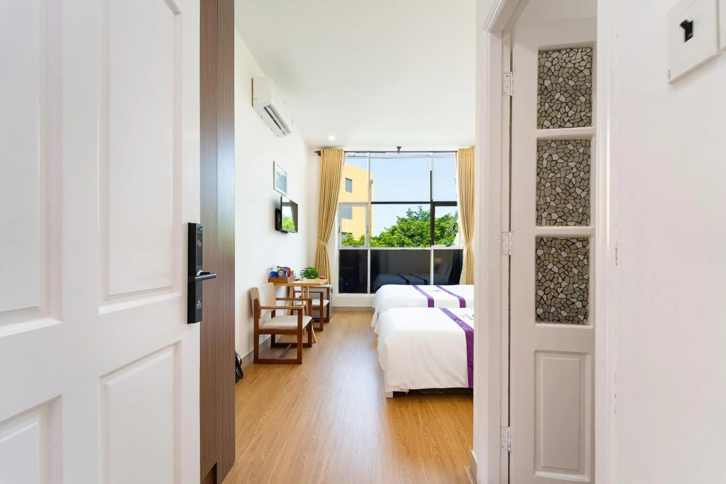 Triple Room in The Sim Hotel Vung Tau Triple Room in The Sim Hotel Vung Tau