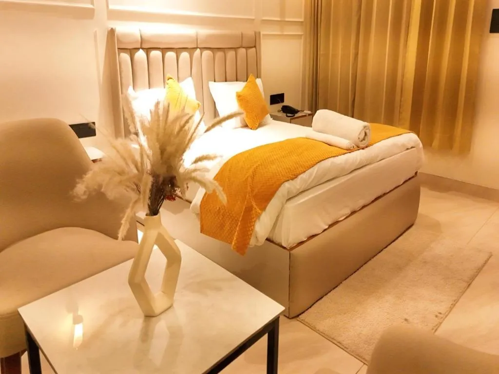 Bed in Yashasvi Himalayan Resort