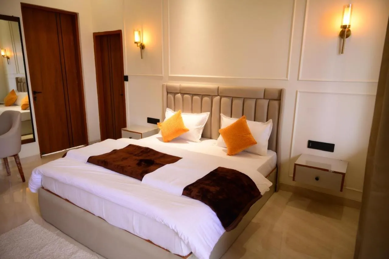 Bed in Yashasvi Himalayan Resort