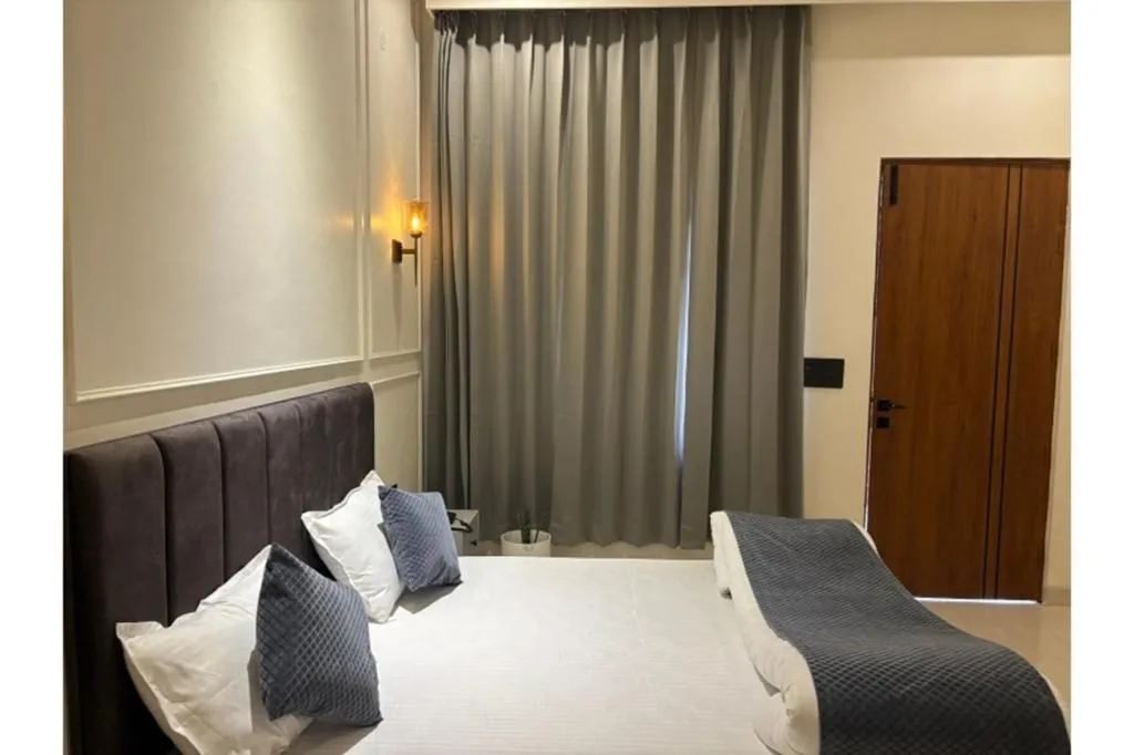 Bed in Yashasvi Himalayan Resort