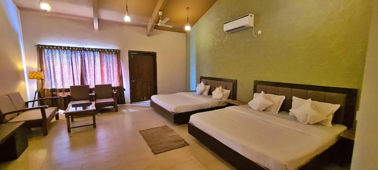 Bed in Greenscape Resort Satpura