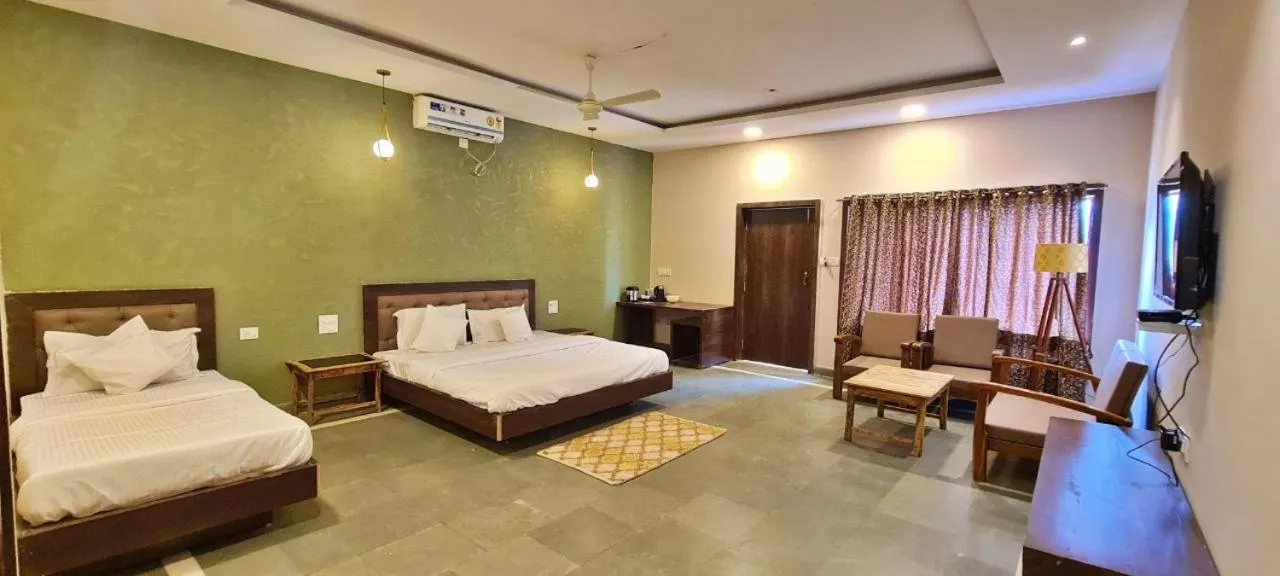 Bed in Greenscape Resort Satpura