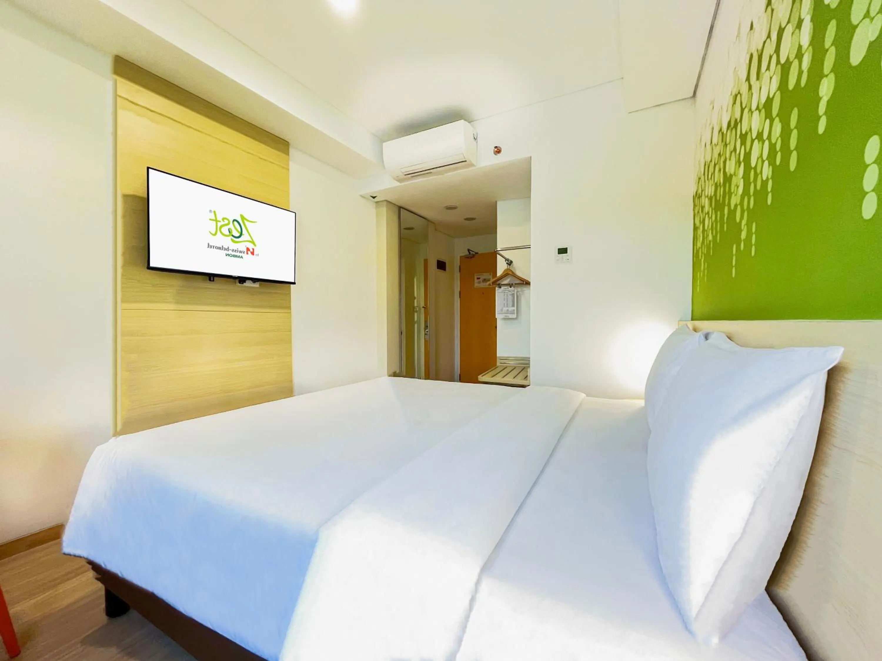 Bed in Zest Ambon by Swiss-Belhotel International