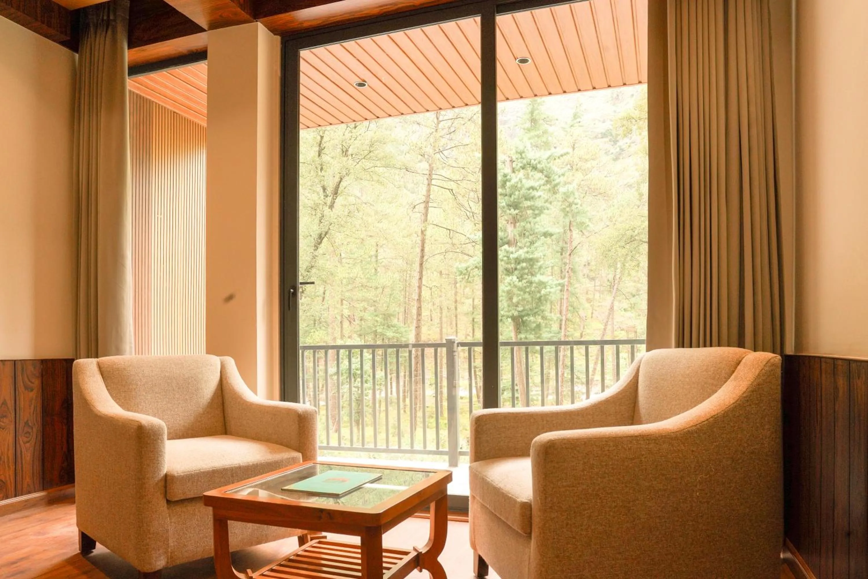 Seating area in North Deodar Resort, Kasol