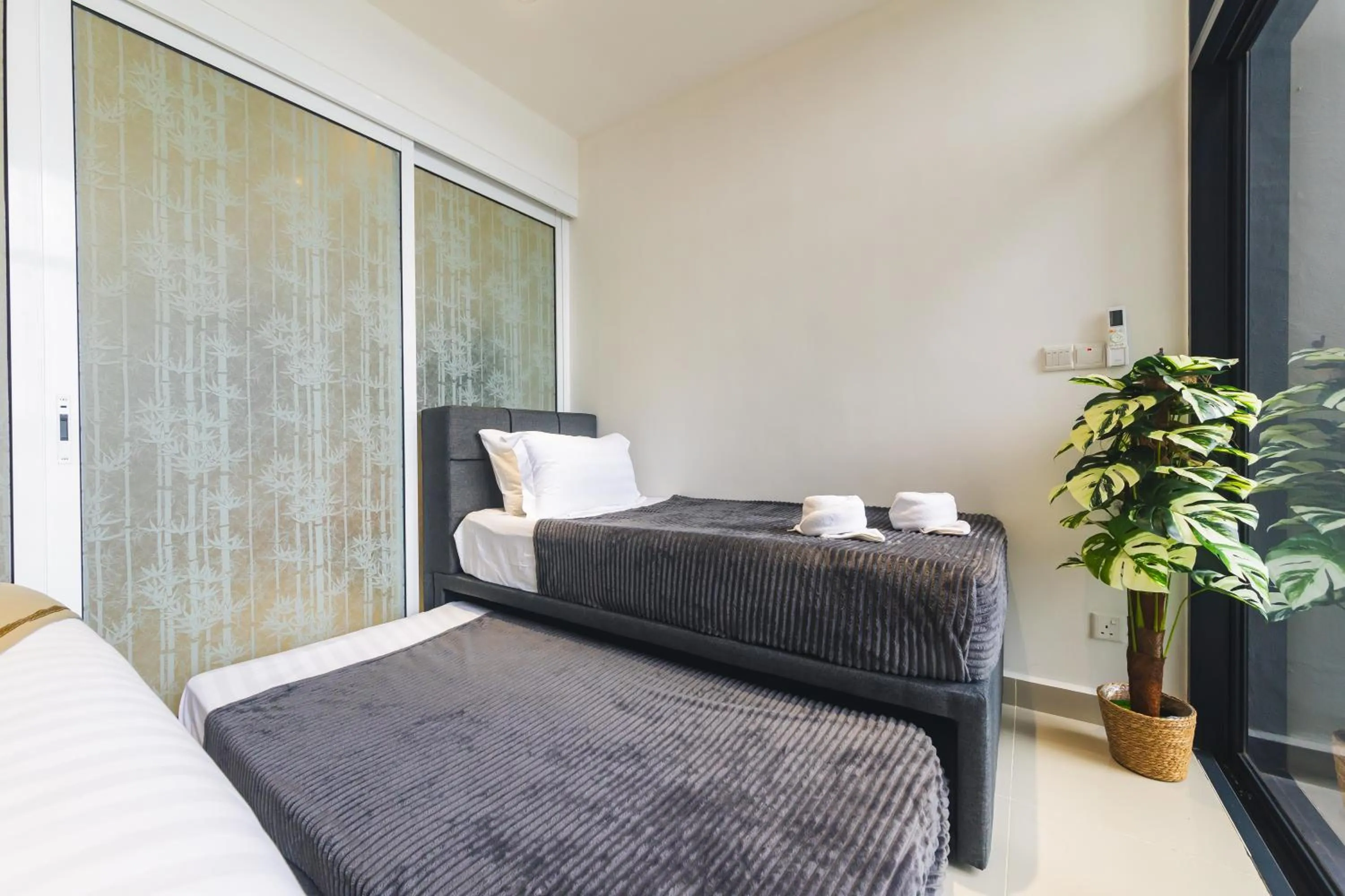 Bed in 5StarPanda Seaview Suites at The Shore Kota Kinabalu