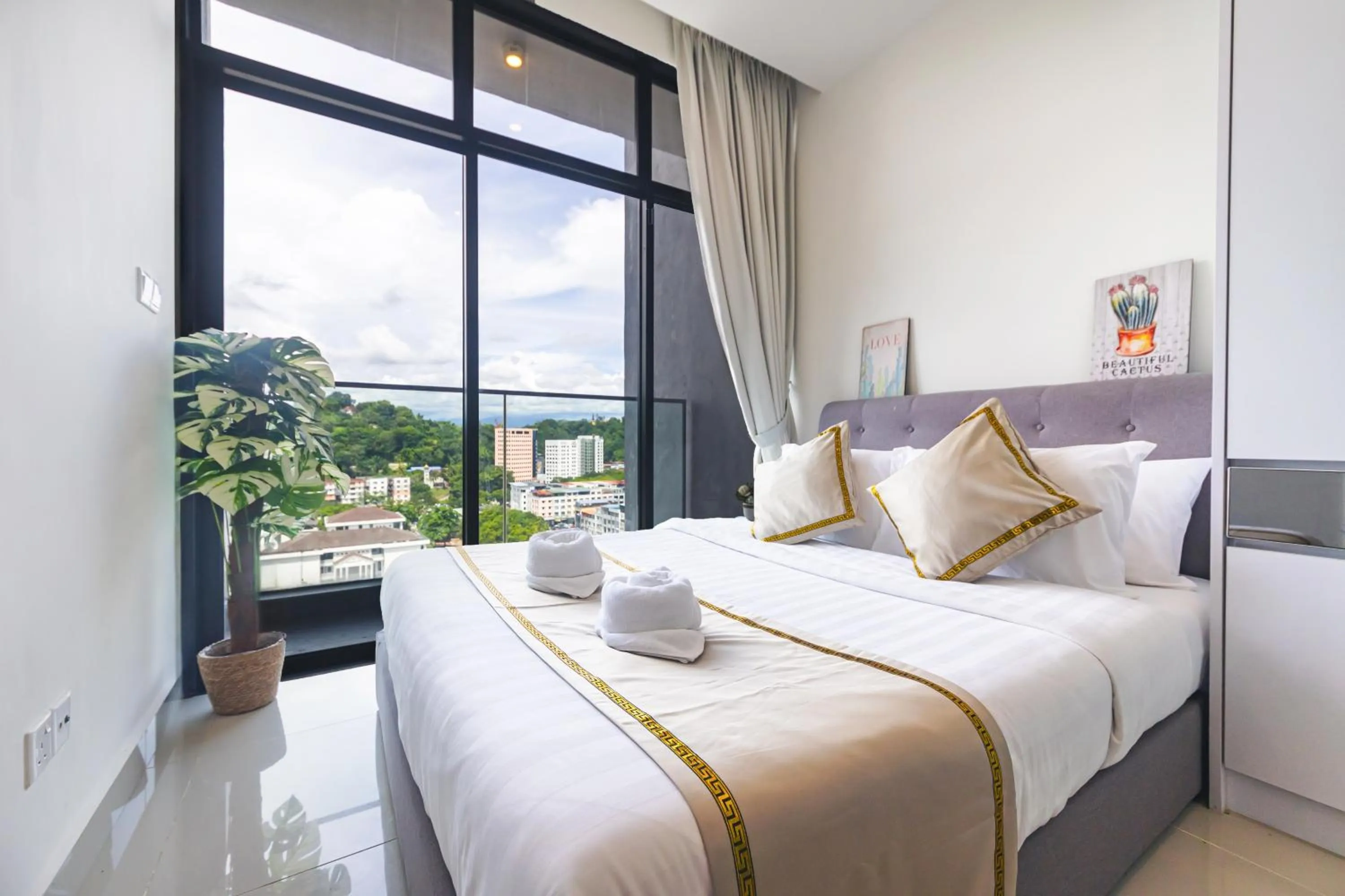 Bed in 5StarPanda Seaview Suites at The Shore Kota Kinabalu