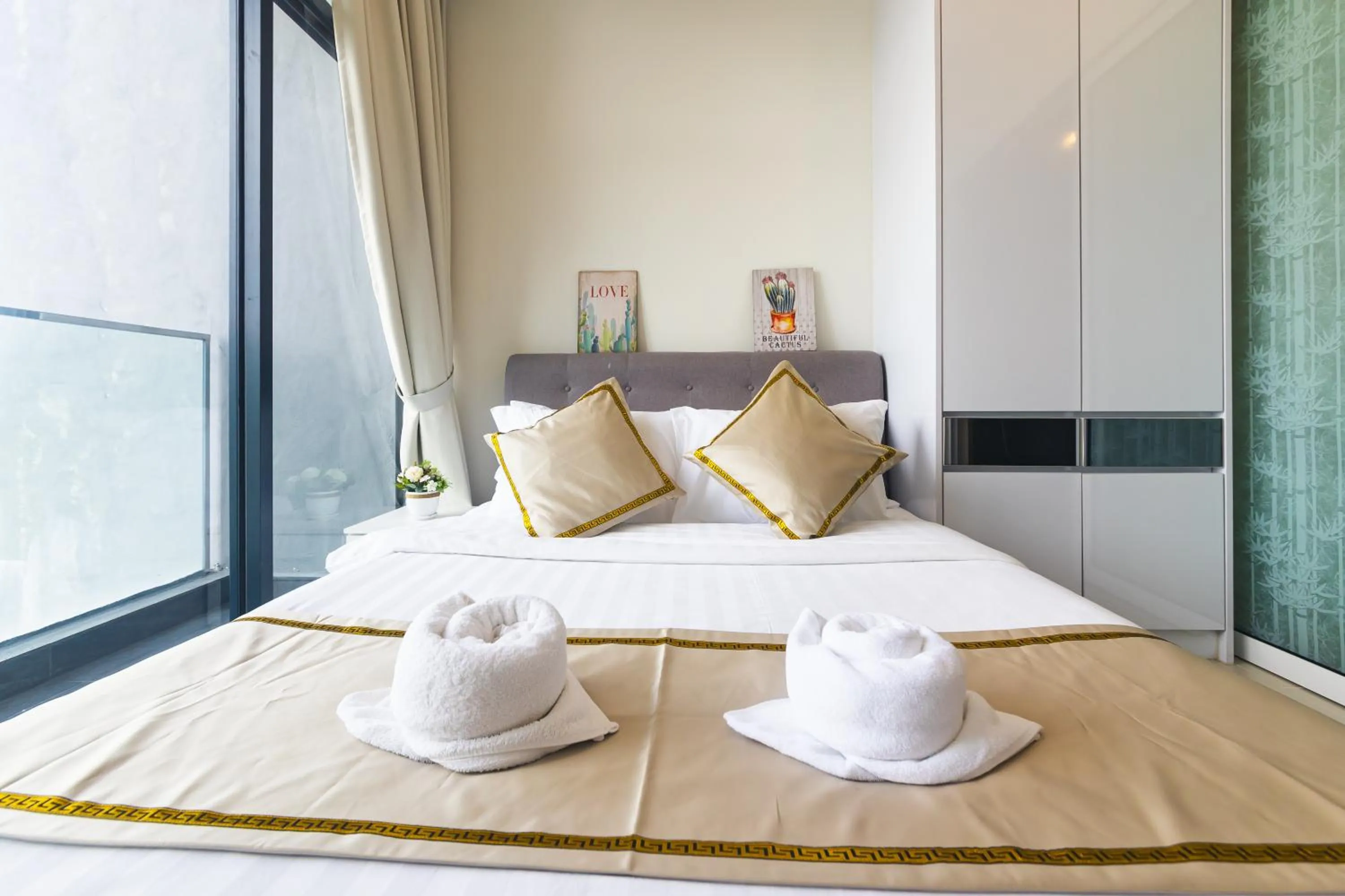 Bed in 5StarPanda Seaview Suites at The Shore Kota Kinabalu