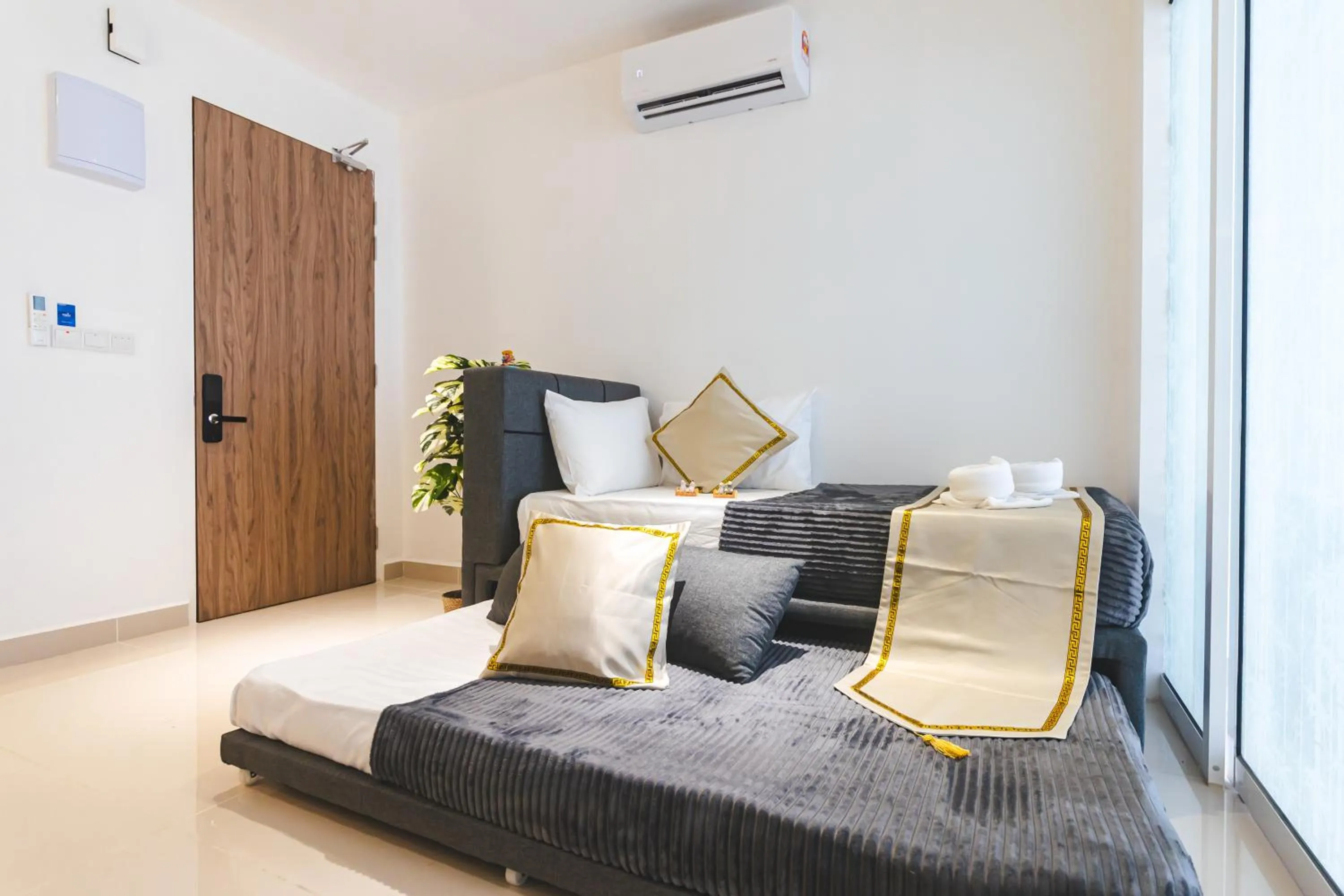 Bed in 5StarPanda Seaview Suites at The Shore Kota Kinabalu