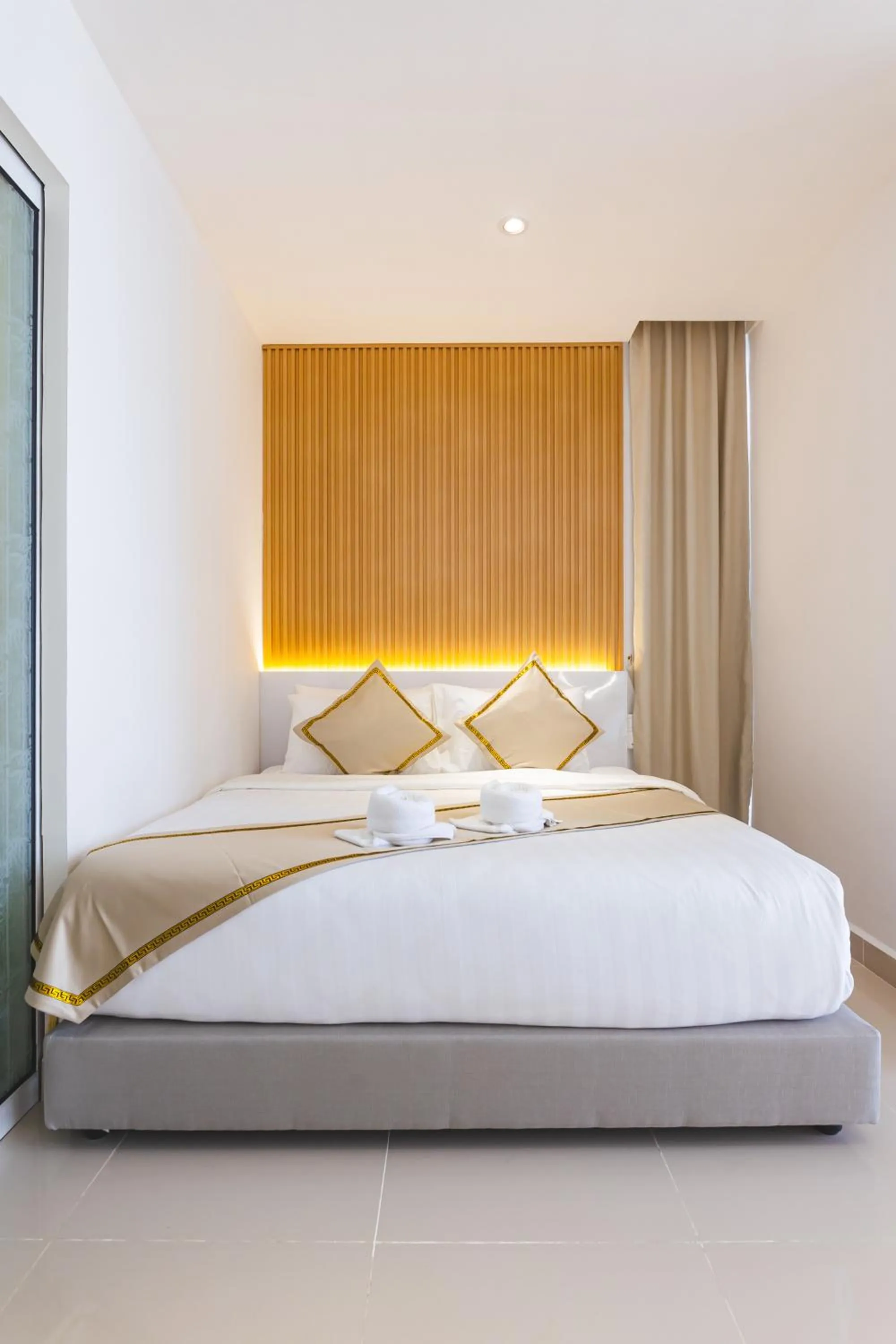 Bed in 5StarPanda Seaview Suites at The Shore Kota Kinabalu