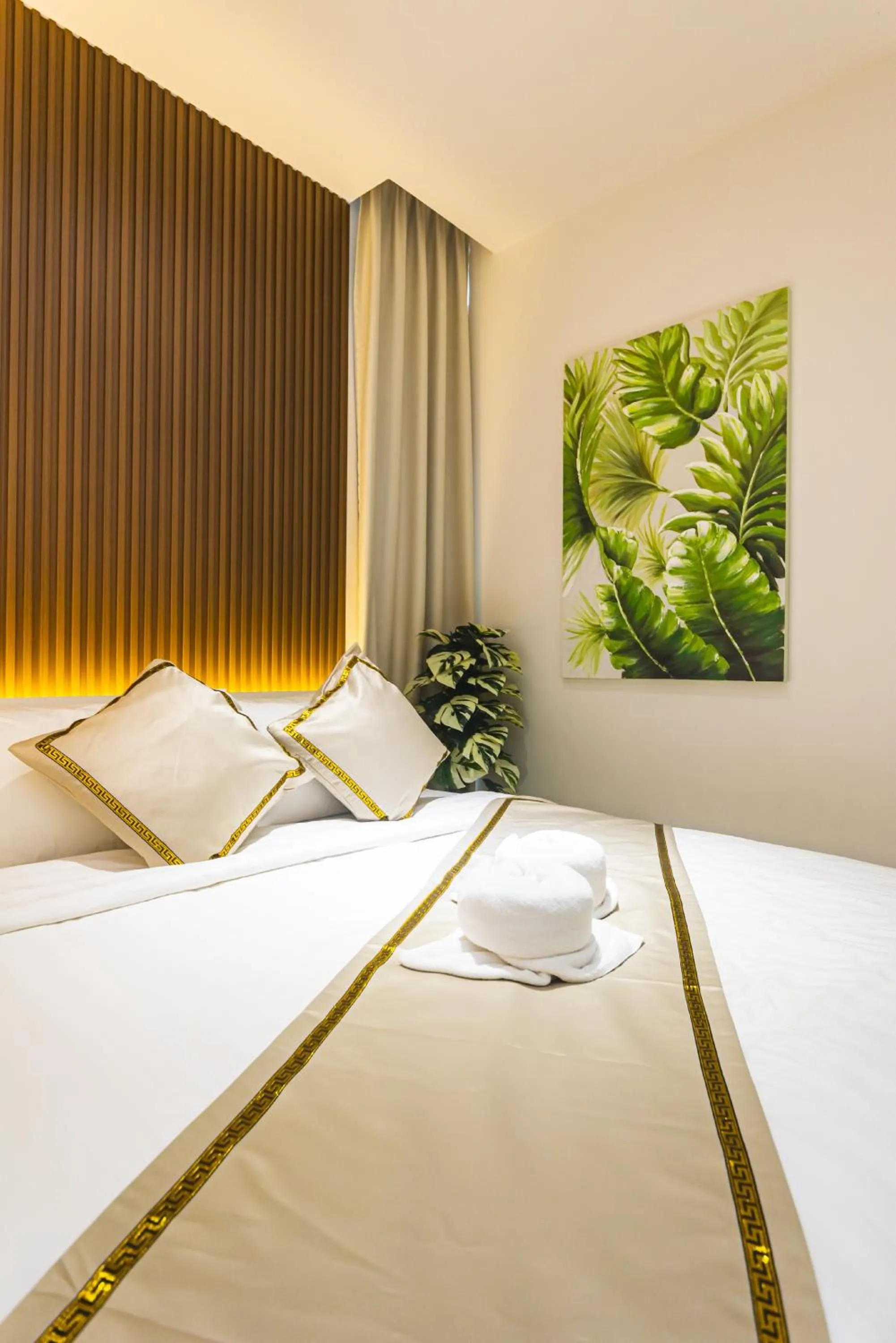 Bed in 5StarPanda Seaview Suites at The Shore Kota Kinabalu