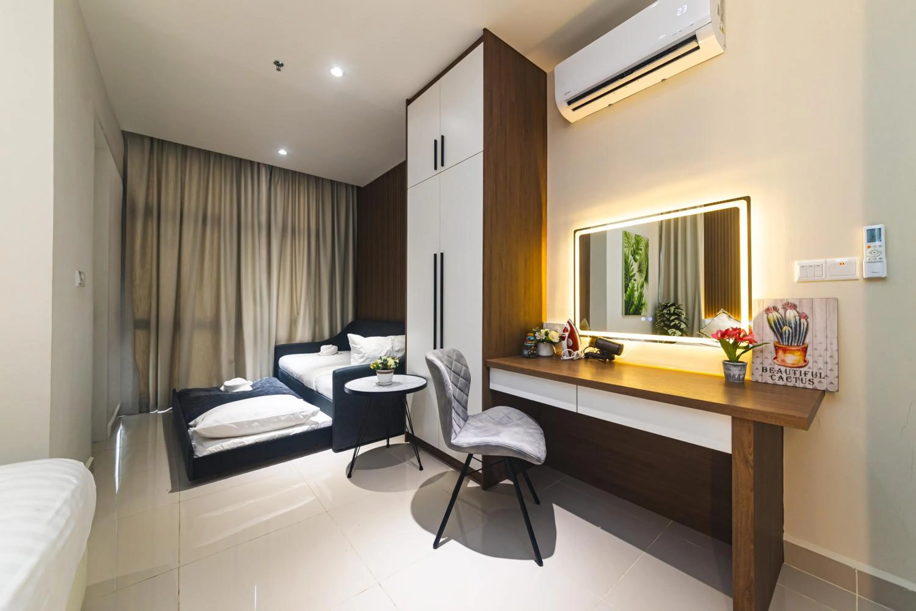 Bed in 5StarPanda Seaview Suites at The Shore Kota Kinabalu