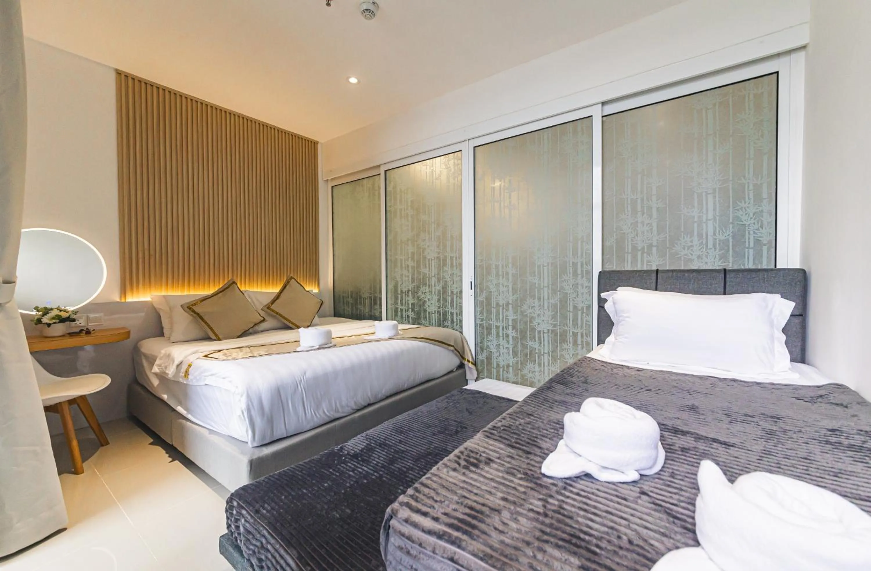 Bed in 5StarPanda Seaview Suites at The Shore Kota Kinabalu