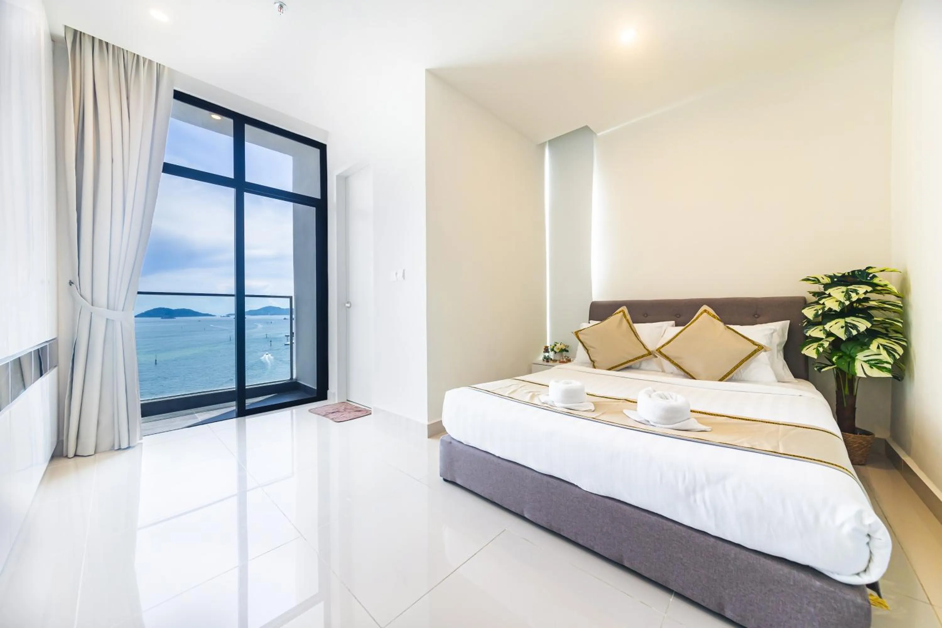 Bed in 5StarPanda Seaview Suites at The Shore Kota Kinabalu