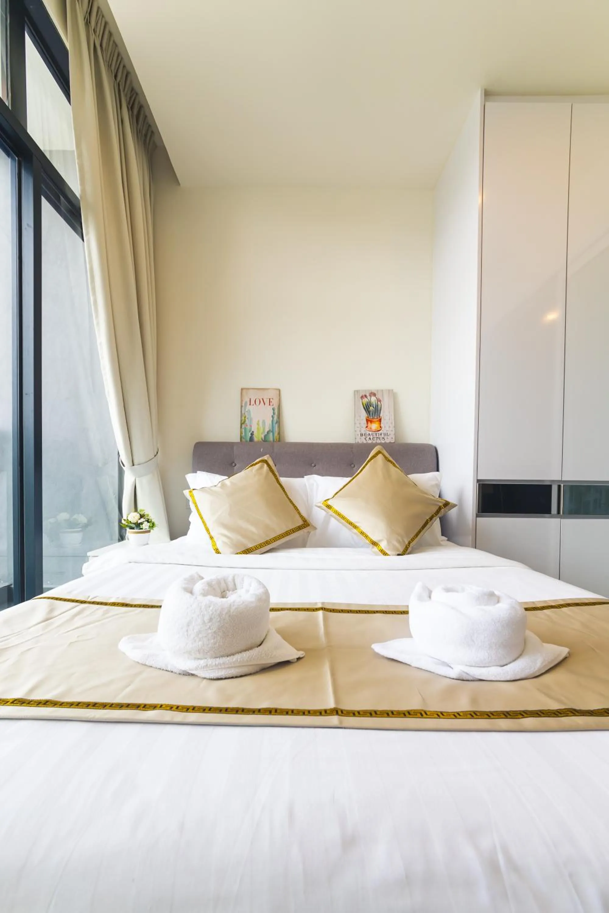 Bed in 5StarPanda Seaview Suites at The Shore Kota Kinabalu