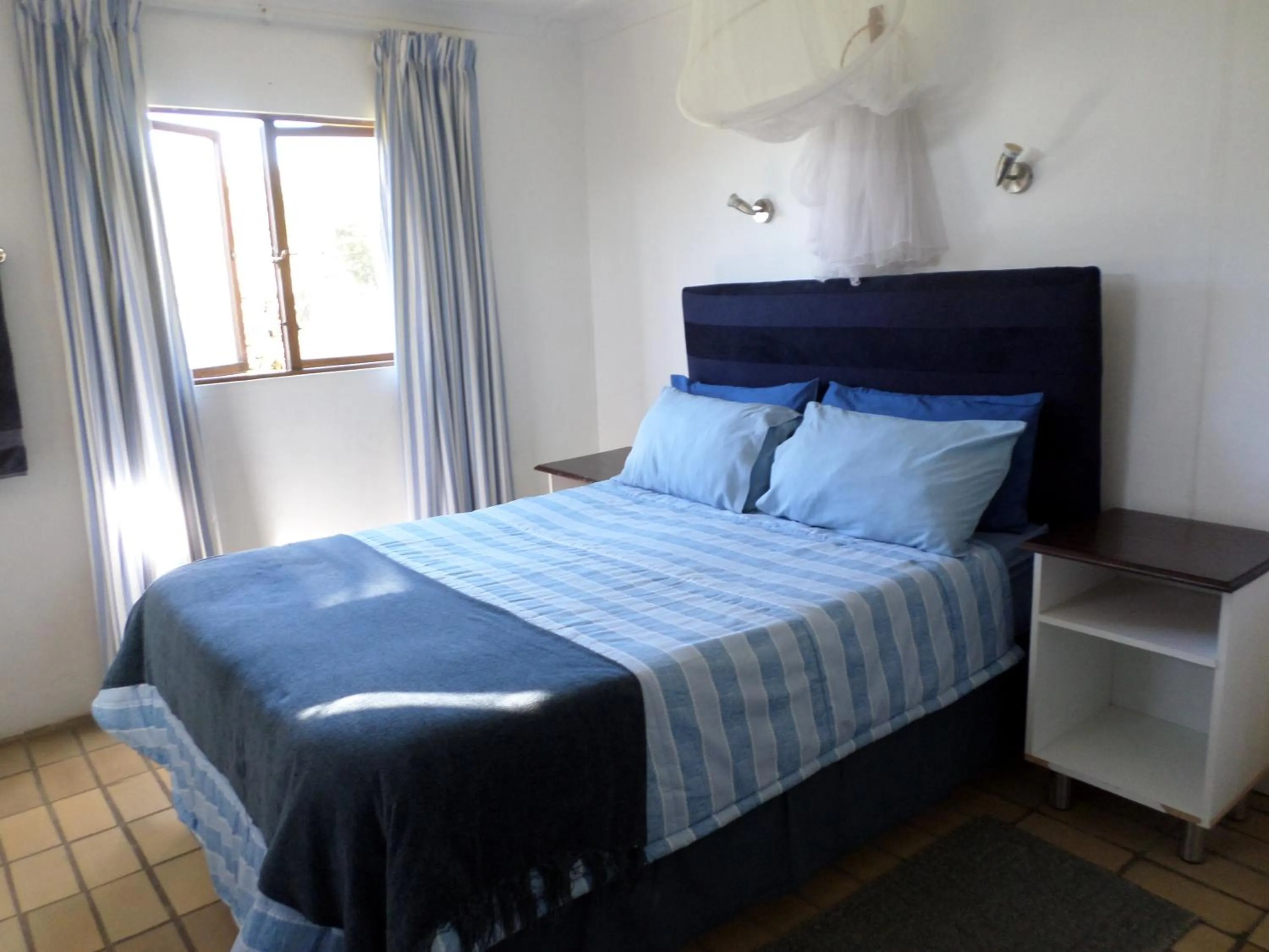 Bed in Geckos B&B and Self-catering