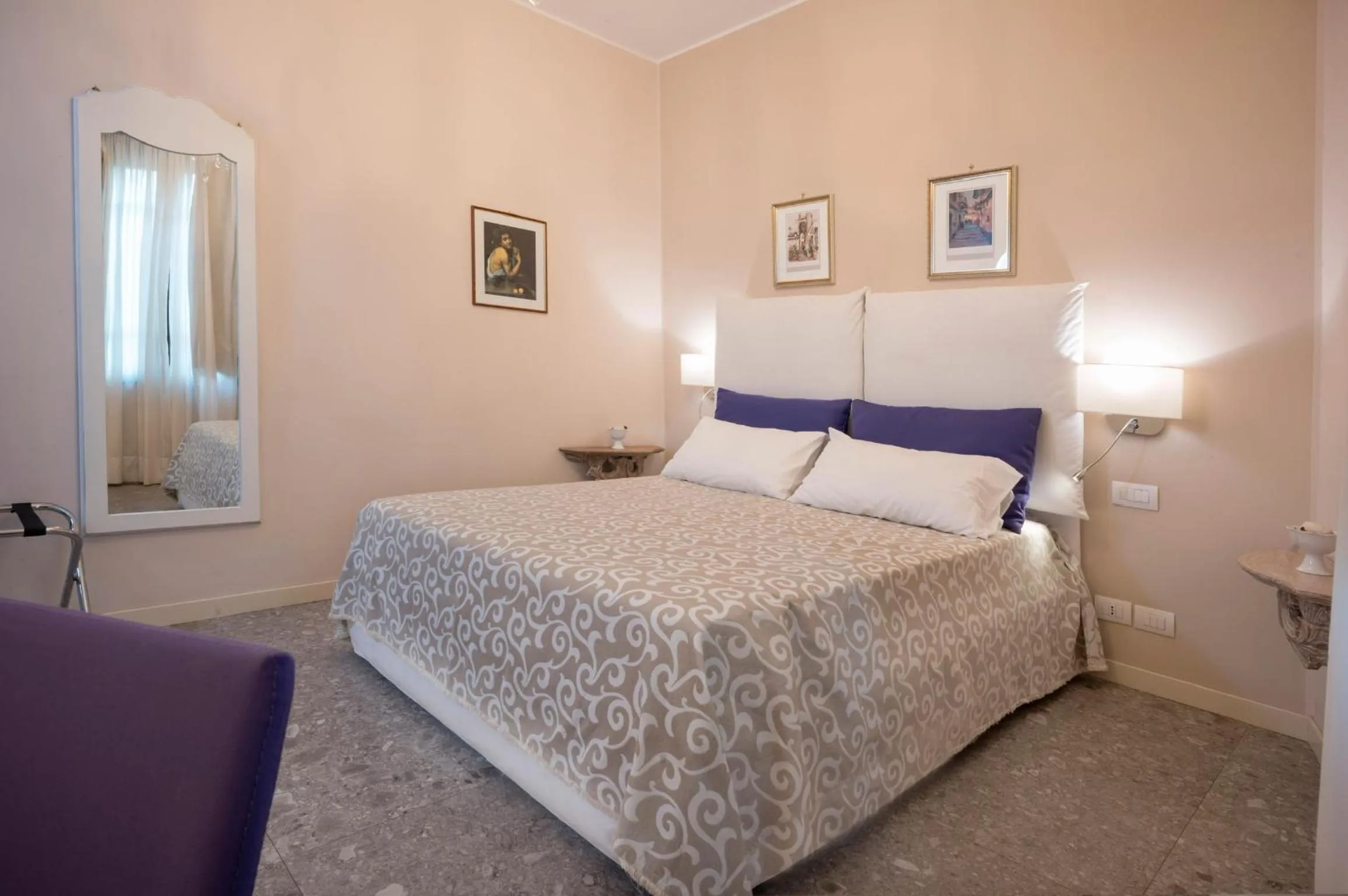 Bed in Porta Di Mezzo Luxury Suites & Rooms