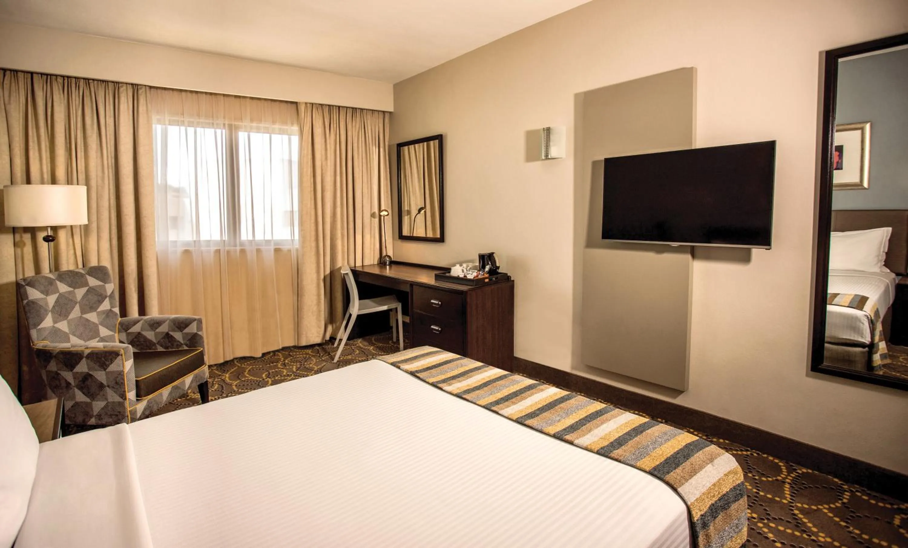 Bed in Garden Court South Beach