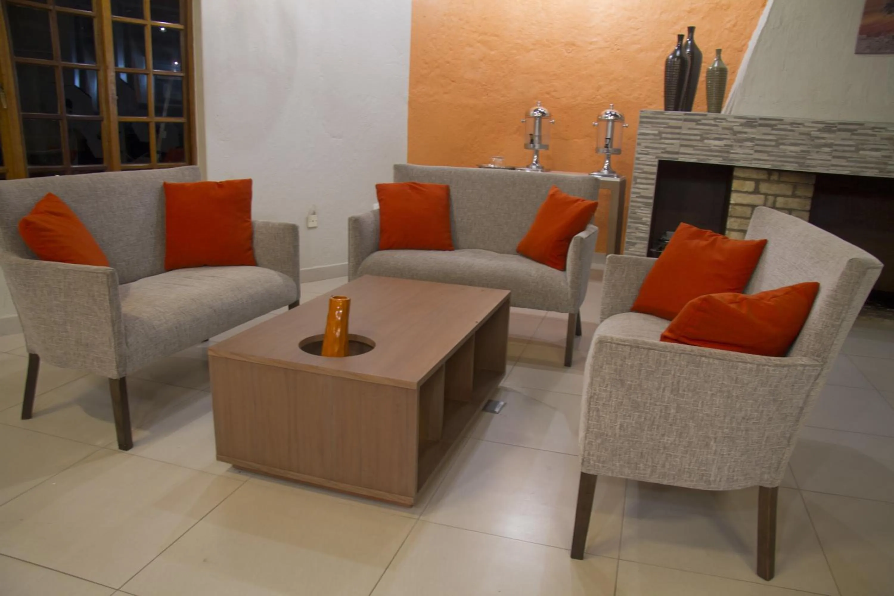 Communal lounge/ TV room in Cresta Marang Gardens Hotel