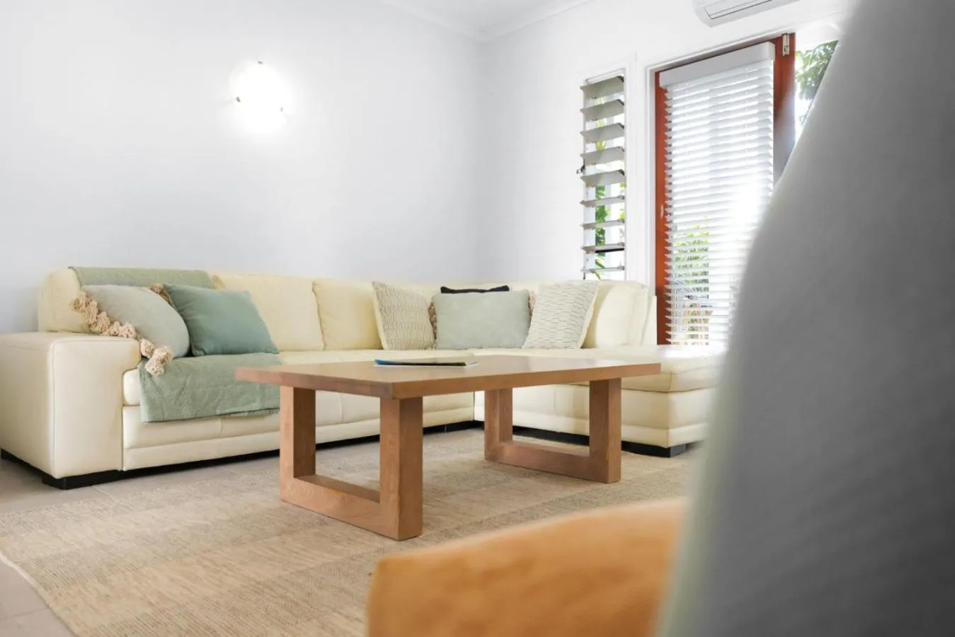 Living room in The Queenslander Family Townhouse Near Four Mile Beach