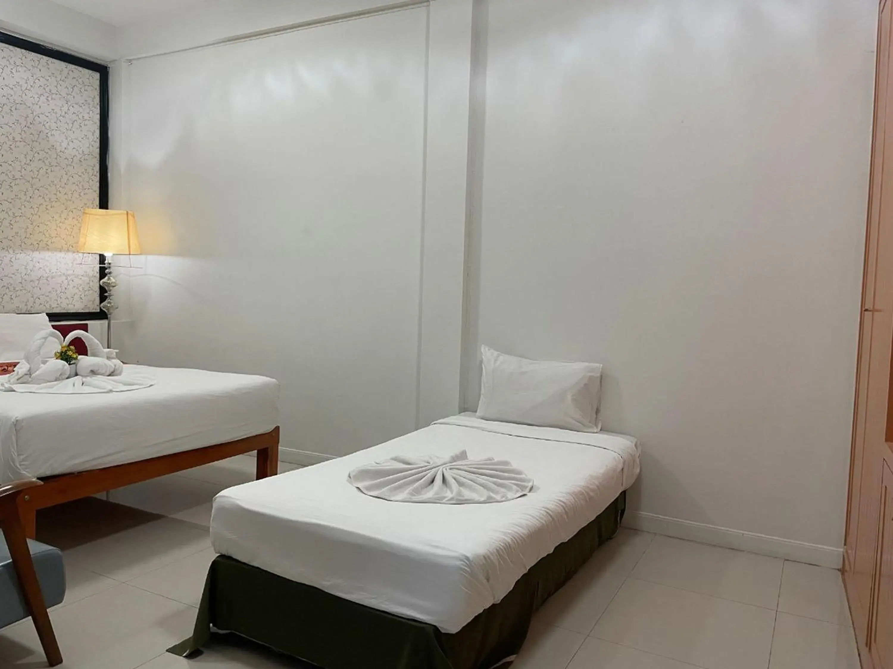 Bed in Happy 2 Hotel Patunam Bed in Happy 2 Hotel Patunam