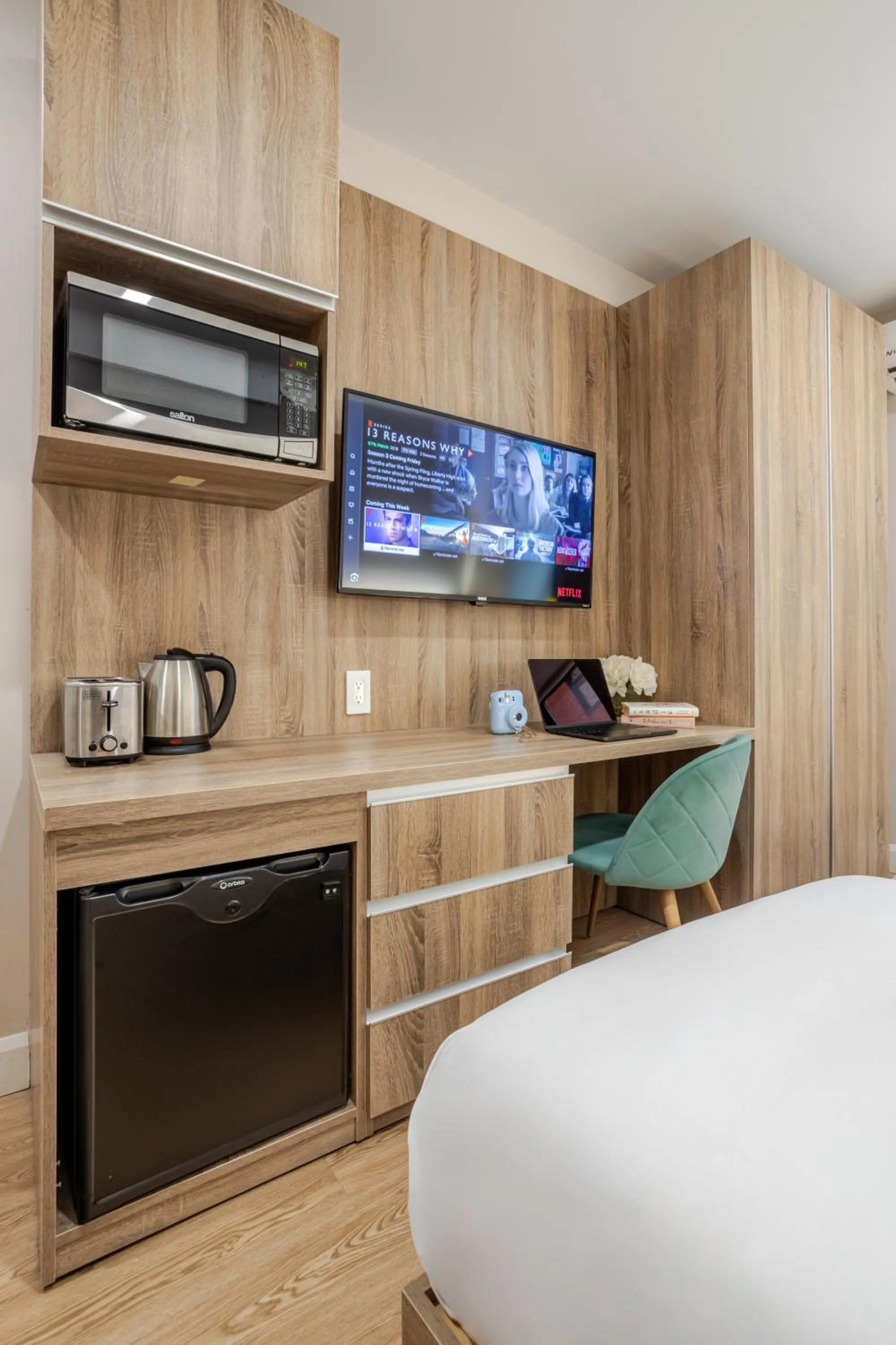 Bed in Olympia Hotel by Lodgo